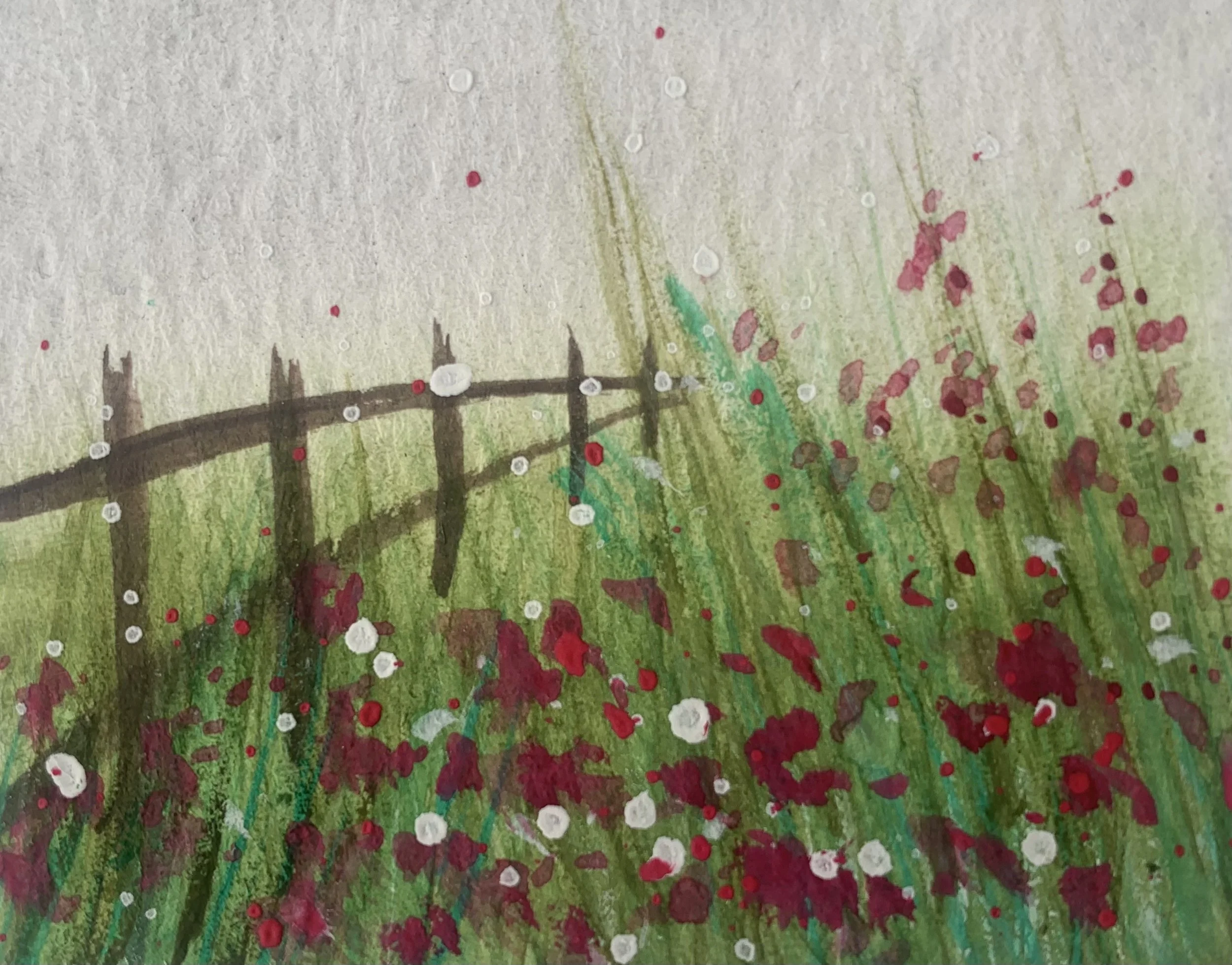 Abstract watercolor painting of a grassy field with red, pink, and white flowers, a brown fence, and a softly colored sky.