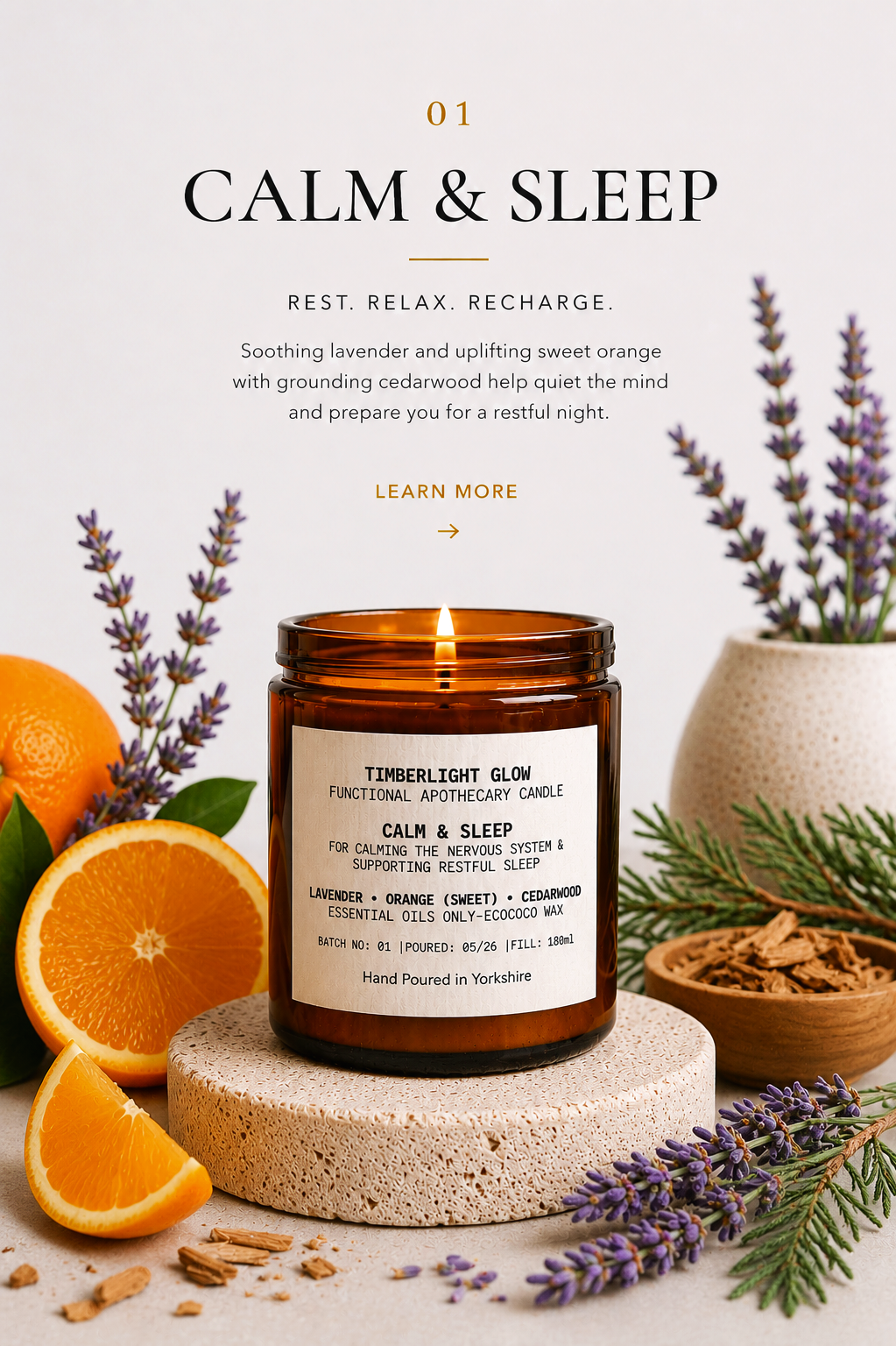 Lit TimberLight Glow Calm & Sleep aromatherapy candle displayed with lavender, sweet orange and cedarwood botanicals.