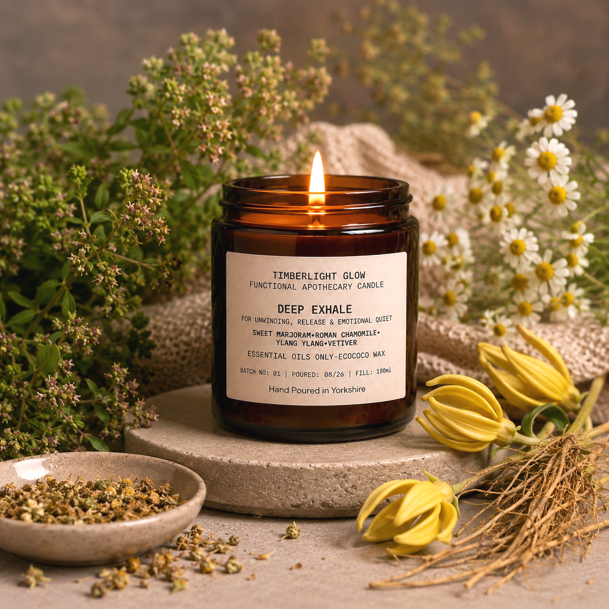 TimberLight Glow Deep Exhale functional apothecary candle in an amber glass jar.