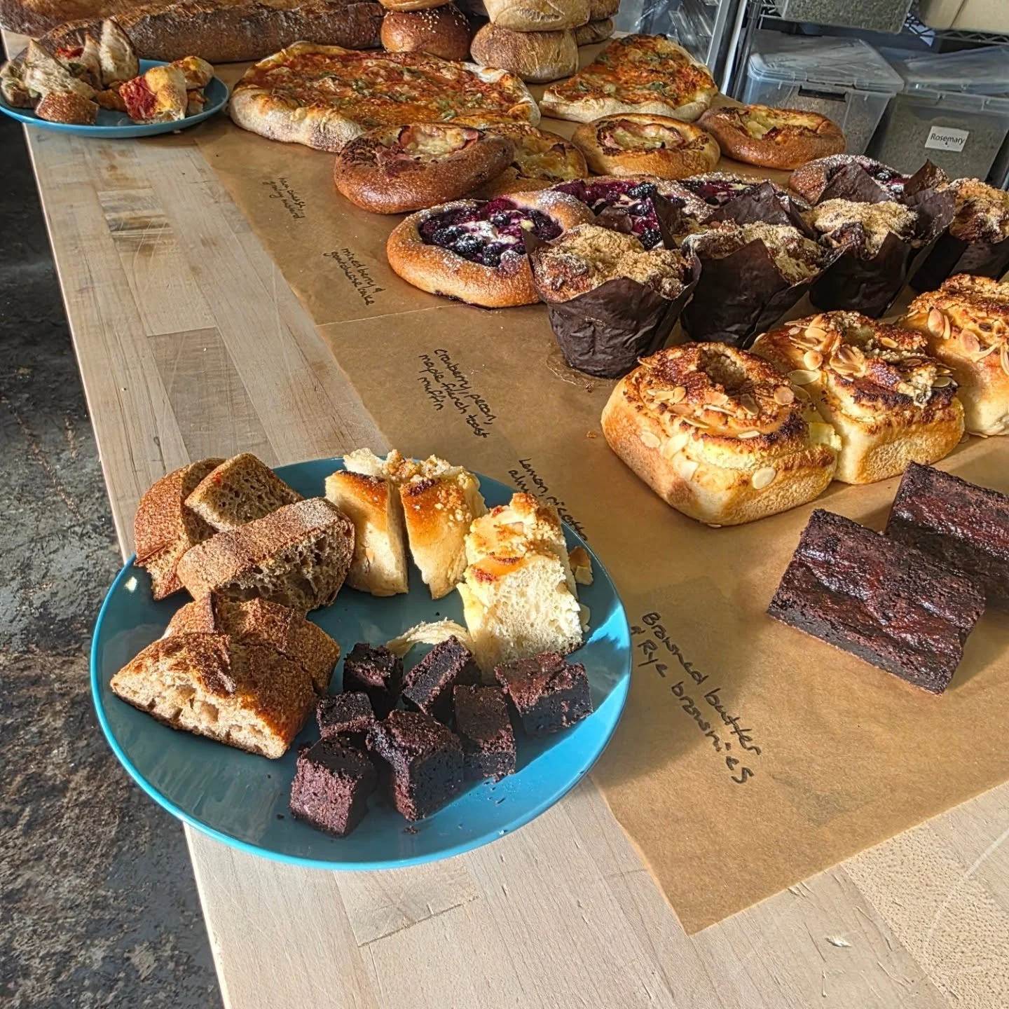 Apparently it's sample day over here! Paul has made so many new items today. 
Sweet swirl: lemon, ricotta, frangipane
French toast muffin: cranberry, pecan, maple
Pizza: fontina, parm, green olives(and some with ham)
Feature loaf: green olive and swe