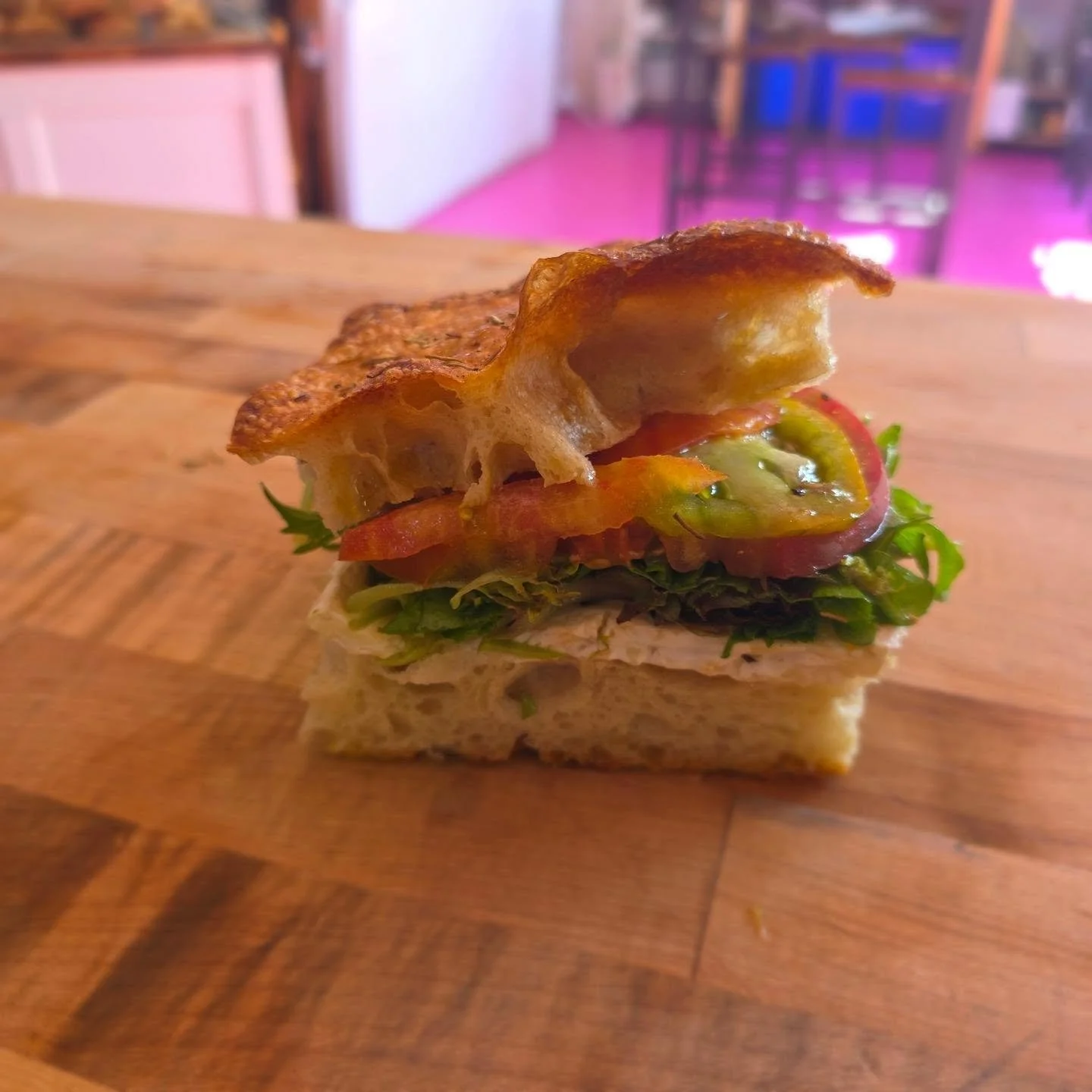 Ive been waiting all season for this! @groundedacresfarm heirloom tomatoes are here in sandwich form with their mixed greens, plus balsamic, and brie.
