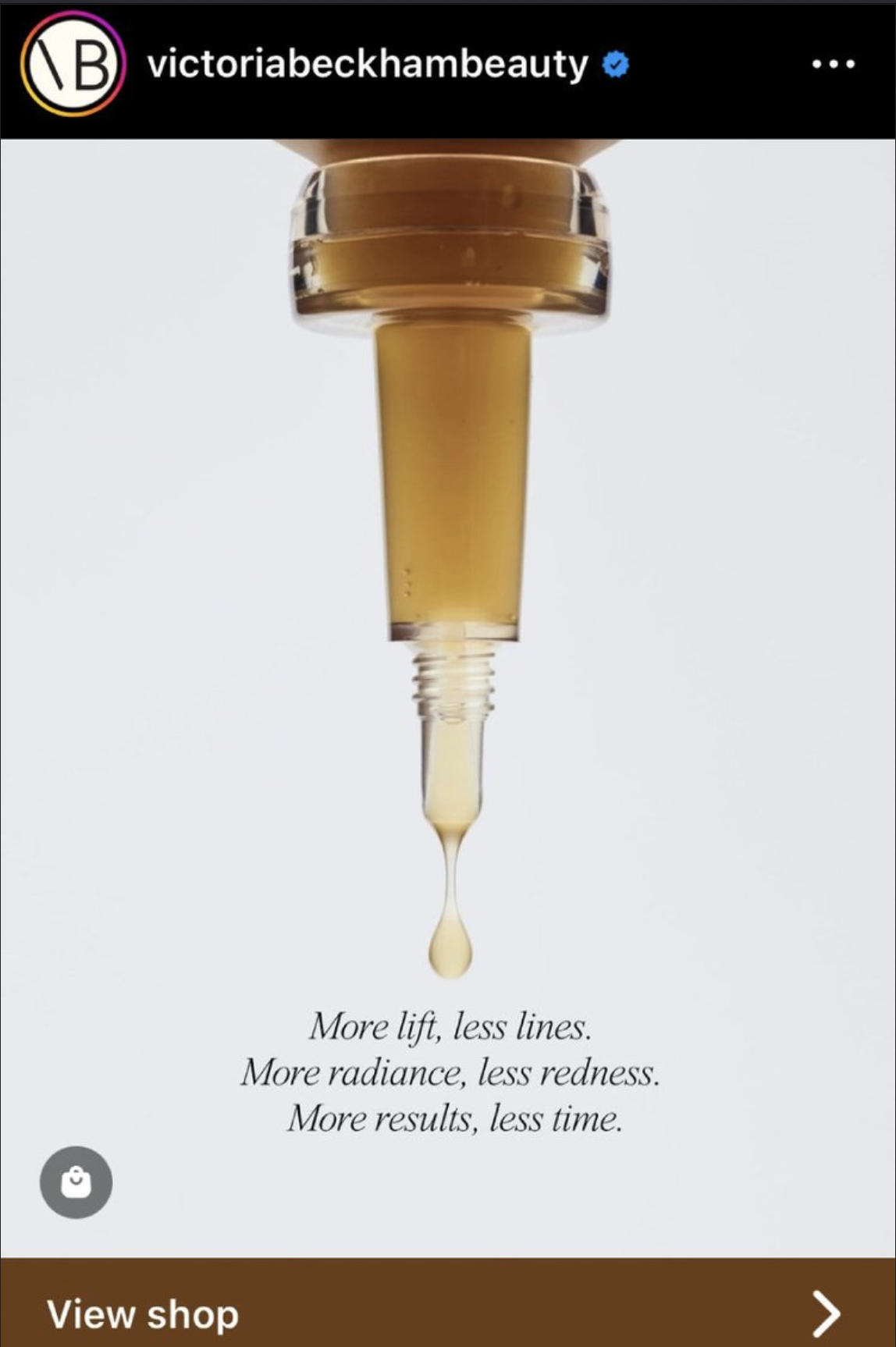 Close-up of a cosmetic syringe with droplet of serum falling below, and promotional text that reads 'More lift, less lines. More radiance, less redness. More results, less time.'