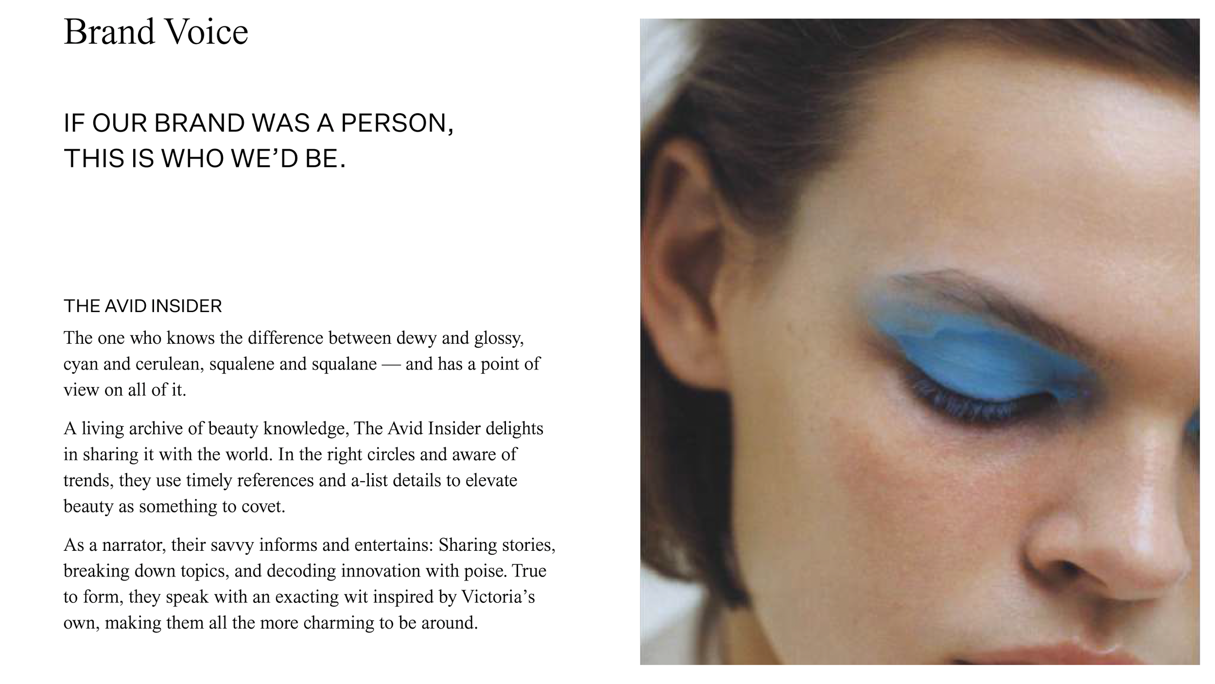 A woman with makeup featuring bright blue eyeshadow, light skin, and dark hair.