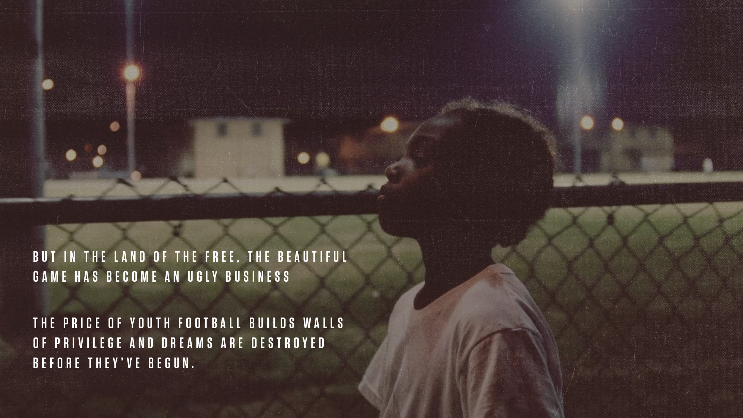 A young girl stands in profile against a chain-link fence at night with blurred city lights in the background. Overlaid text reads: "But in the land of the free, the beautiful game has become an ugly business. The price of youth football builds walls of privilege and dreams are destroyed before they've begun."