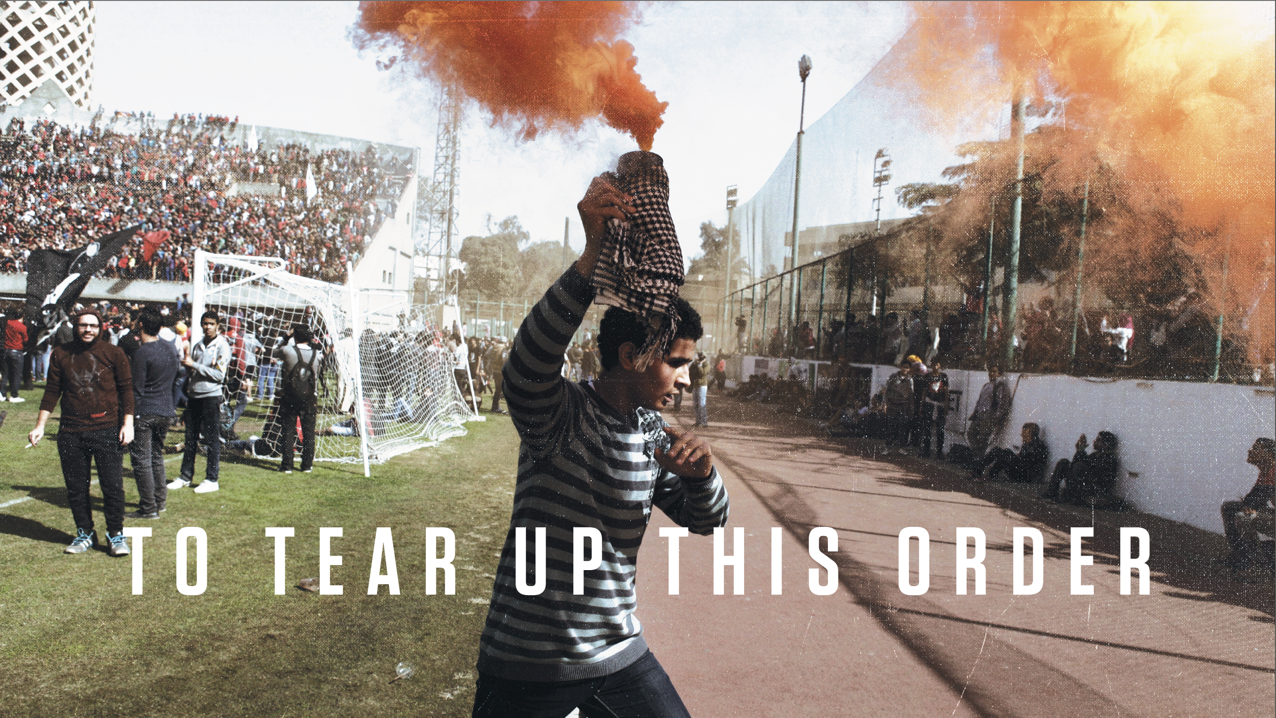 A young man with a striped sweater holding a smoke flare on a crowded soccer field, with orange smoke and a large crowd in the background, and text that reads 'TO TEAR UP THIS ORDER'.