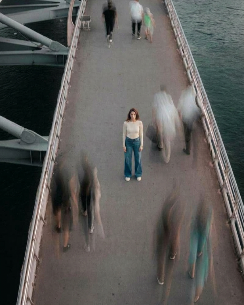 Aerial black and white photo of people in motion on a bridge — therapist Pennsylvania and New Jersey serving creatives, neurodivergent adults and complex feelers