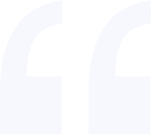 Close-up of large light purple quotation marks on a black background.
