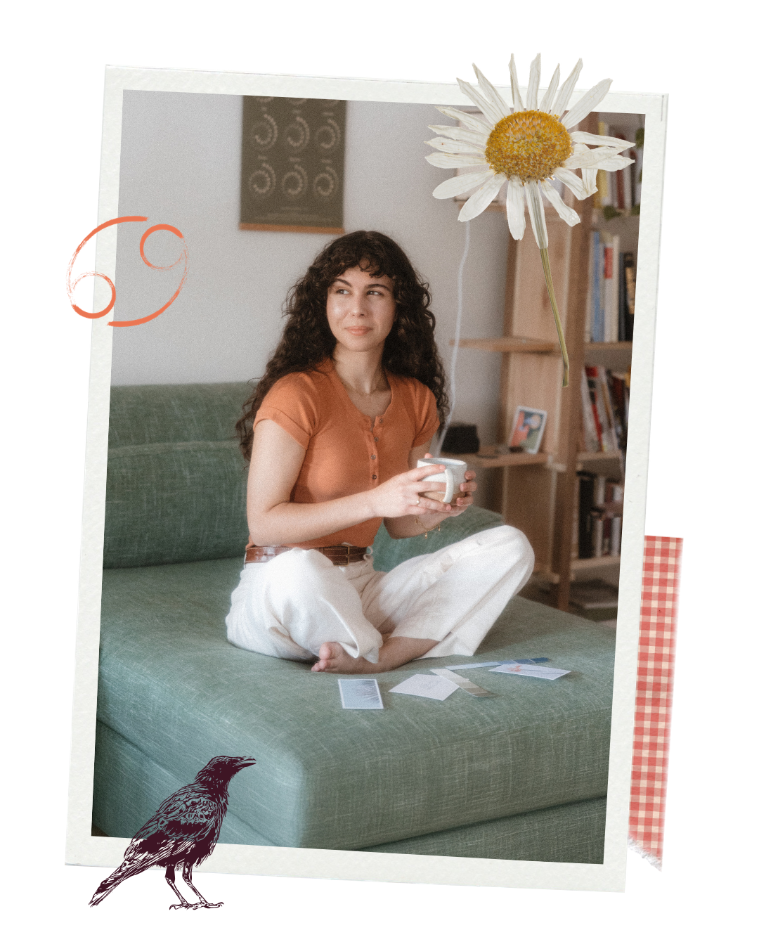 A woman with curly hair sitting cross-legged on a green couch, holding a white mug, gazing to her right in a cozy living room with a bookshelf and artwork behind her, with a large daisy flower and a black bird illustration overlay.