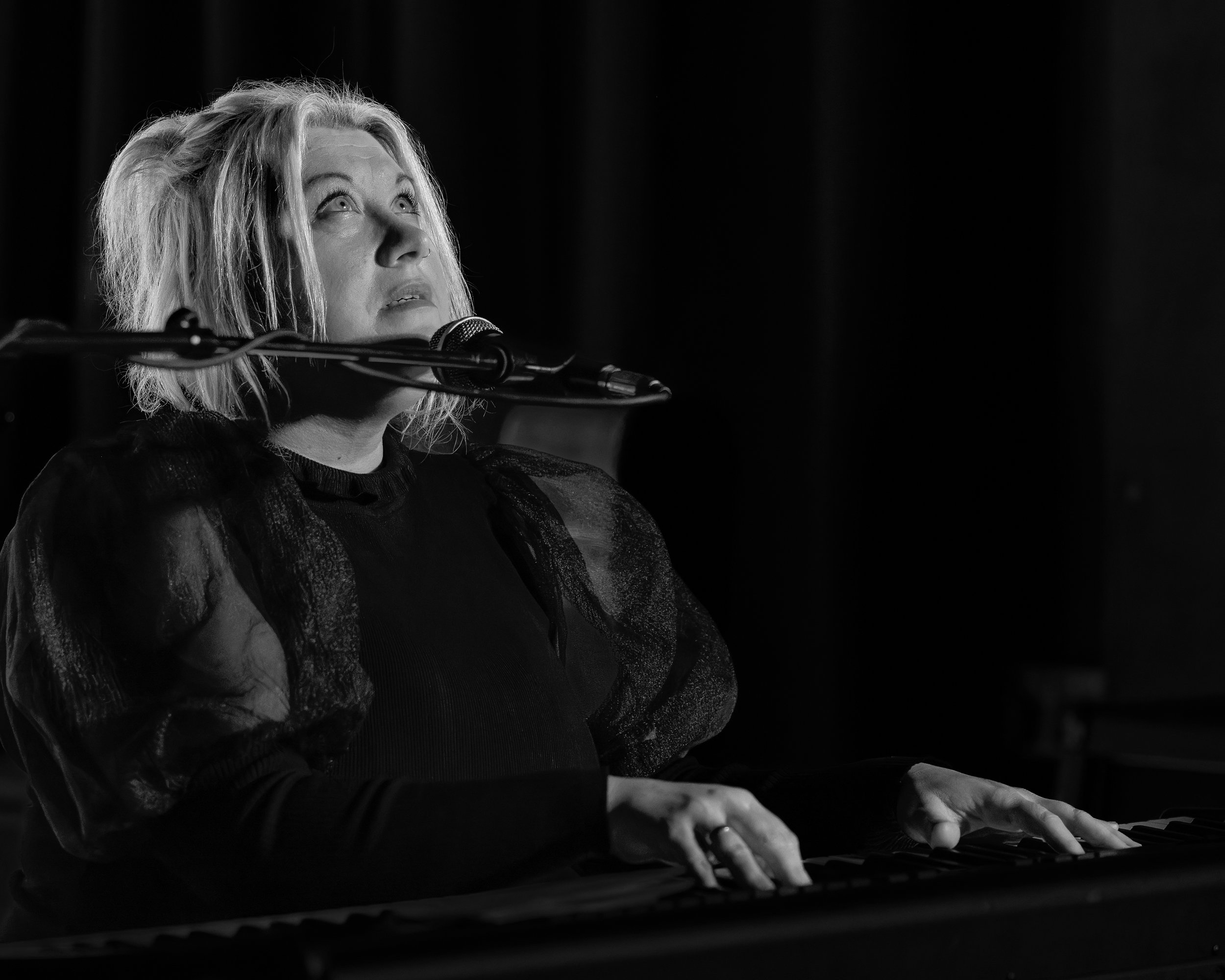 JJ Lovegrove performing at the final Soundhive Social gig, Duffy's Bar, Leicester. 12th December 2024. Fujifilm X-T5, XF90mm, 1/125, f2, ISO 3200. © Chris Tweed