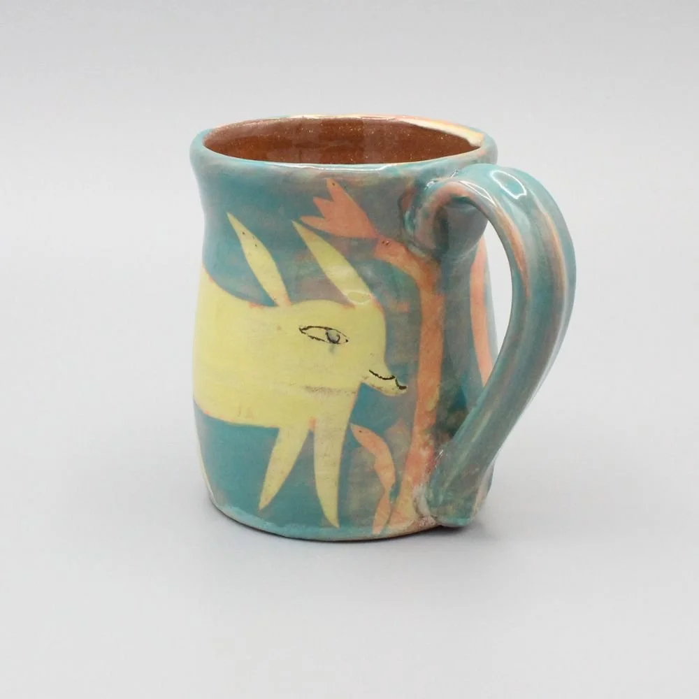 Yellow Rabbits Mug, pink and orange