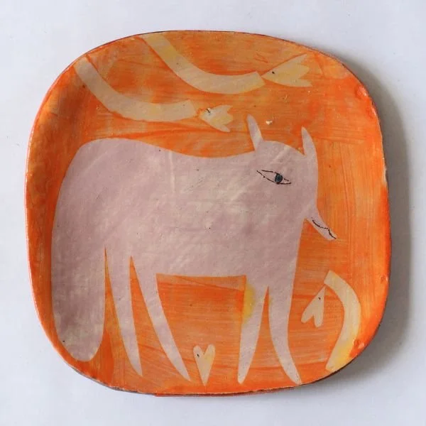 Orange plate with pink fox
