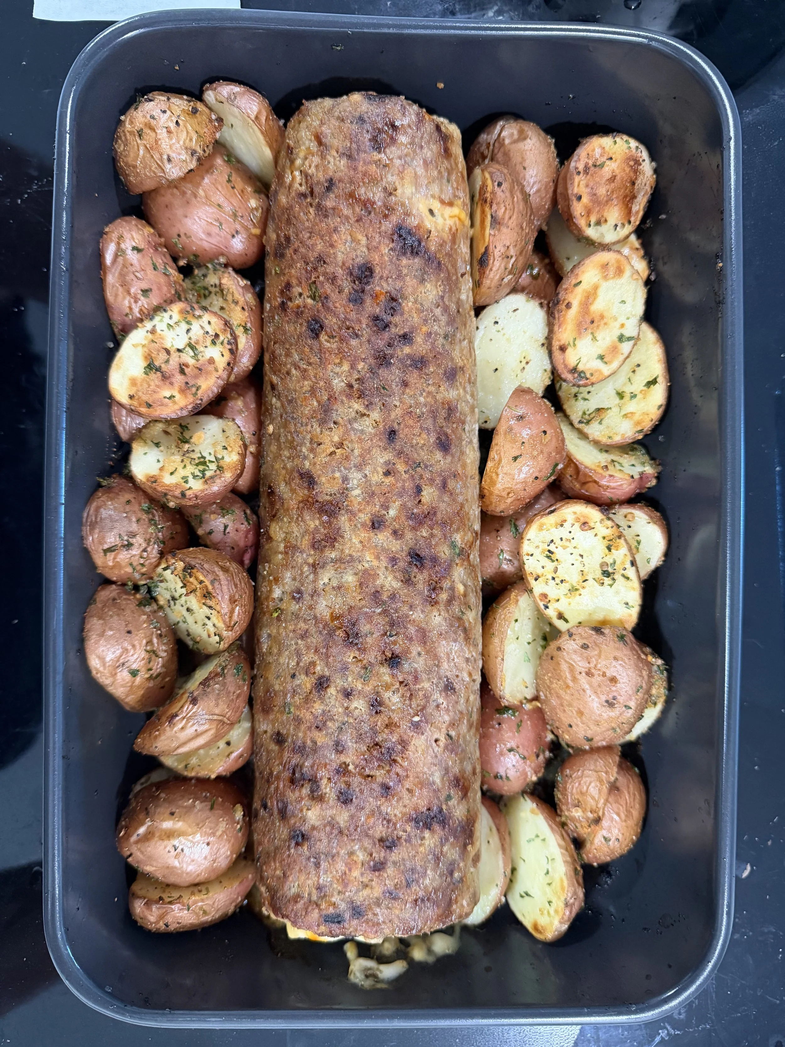 Polpettone con Patate
(Turkey meat roll with roasted potatoes)