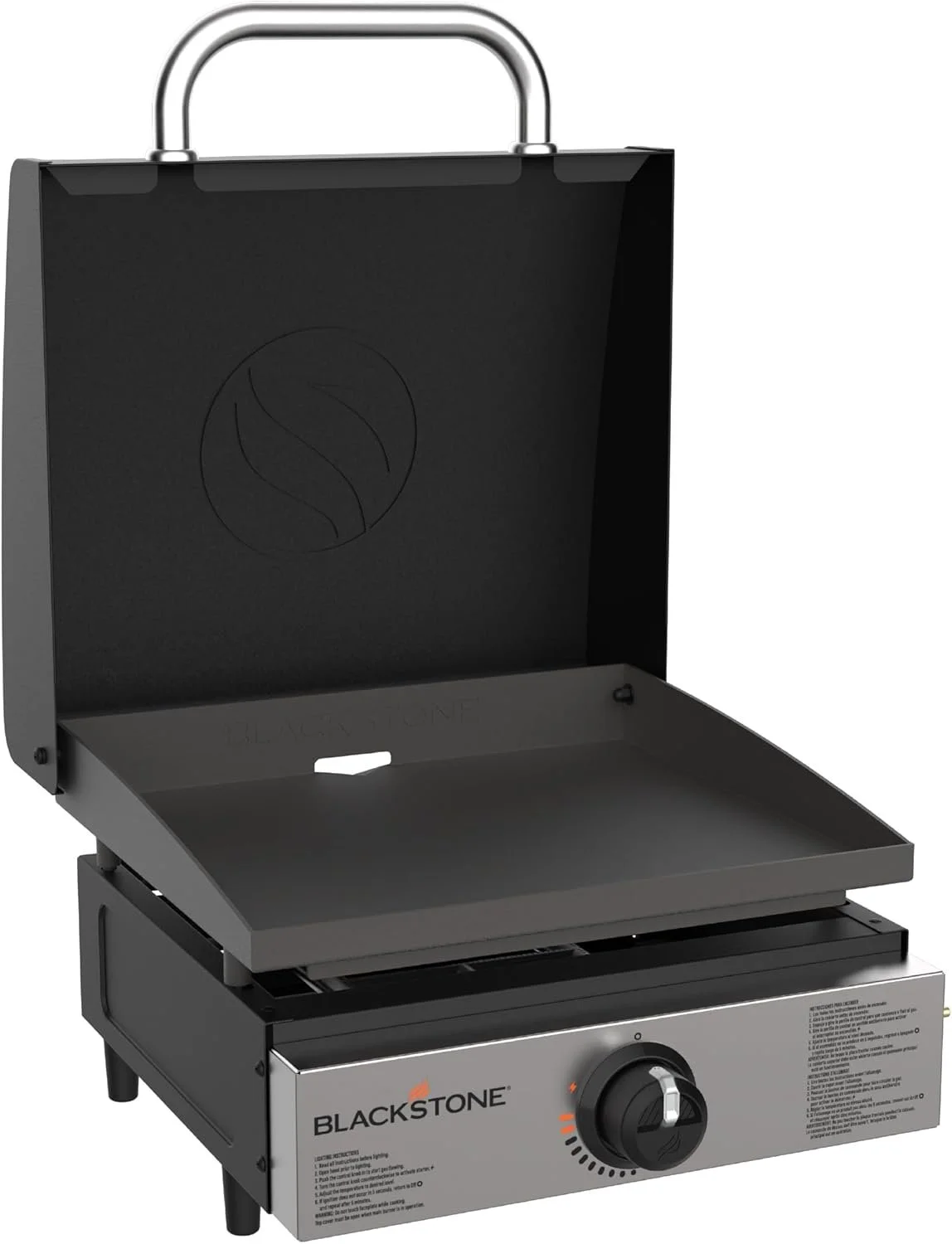 Blackstone griddle with open lid, cooking surface, and control knob