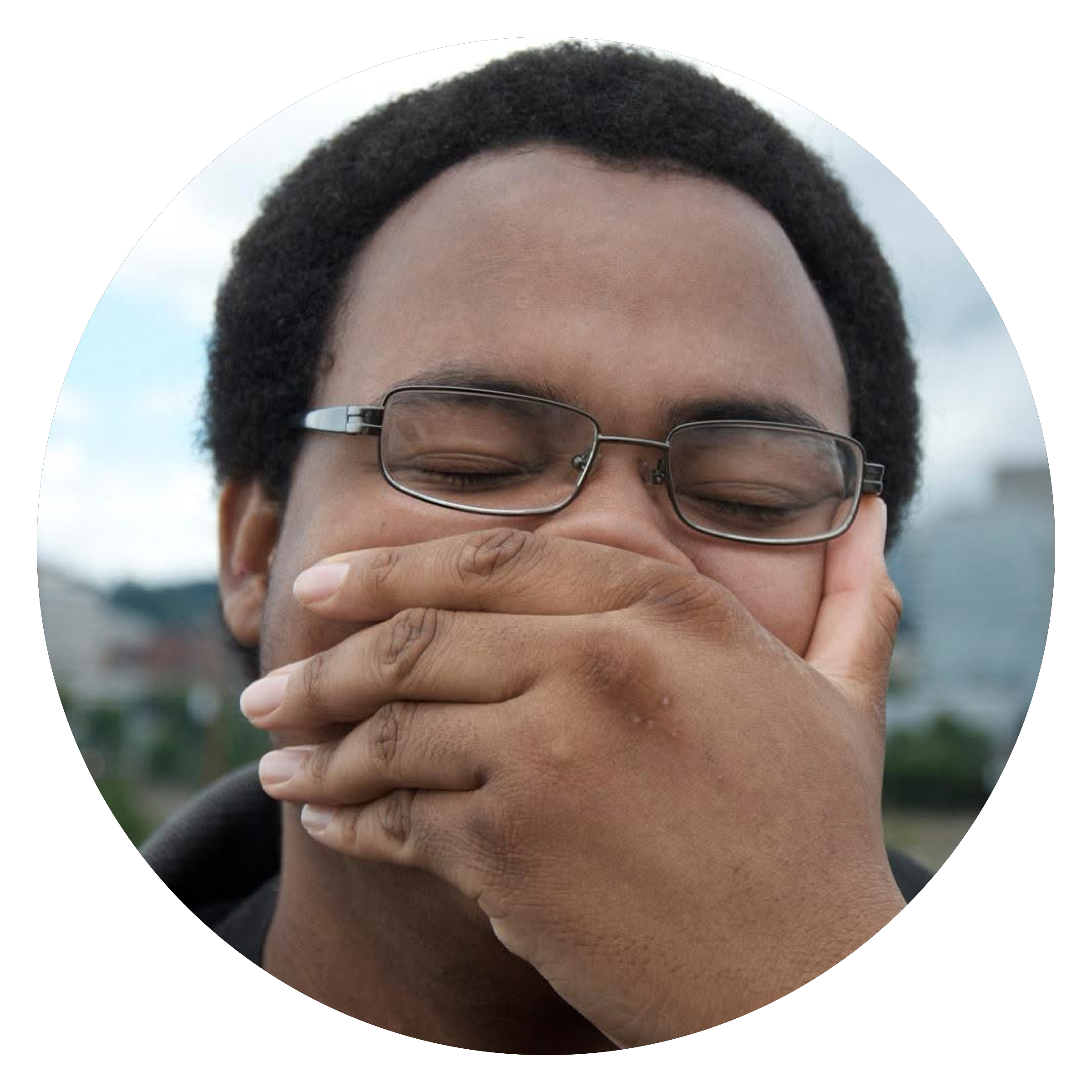 Alexander Wright, Graphic Designer for Late Lyrics, headshot with hand partially covering face