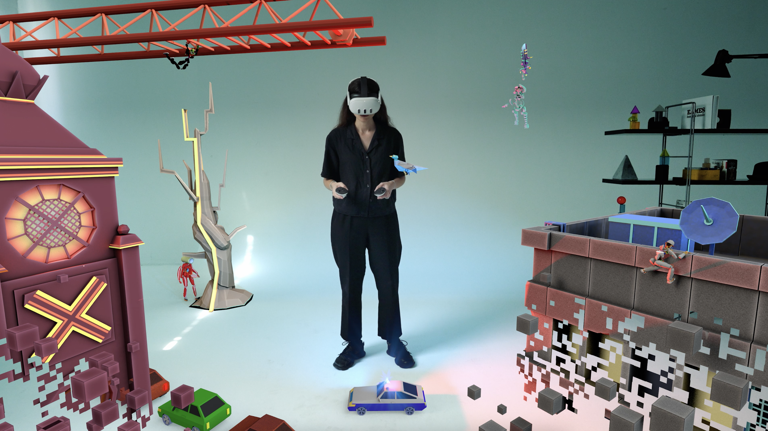 A woman is wearing a virtual reality headset and holding controllers in a digital art studio. Surrounding her are various colorful virtual elements and objects, including a clock, pixelated structures, toy-like cars, robots, and other digital designs.