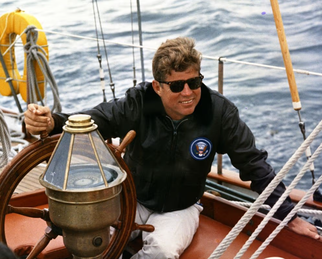 John F. Kennedy wearing the American Optical Saratoga sunglasses while boating