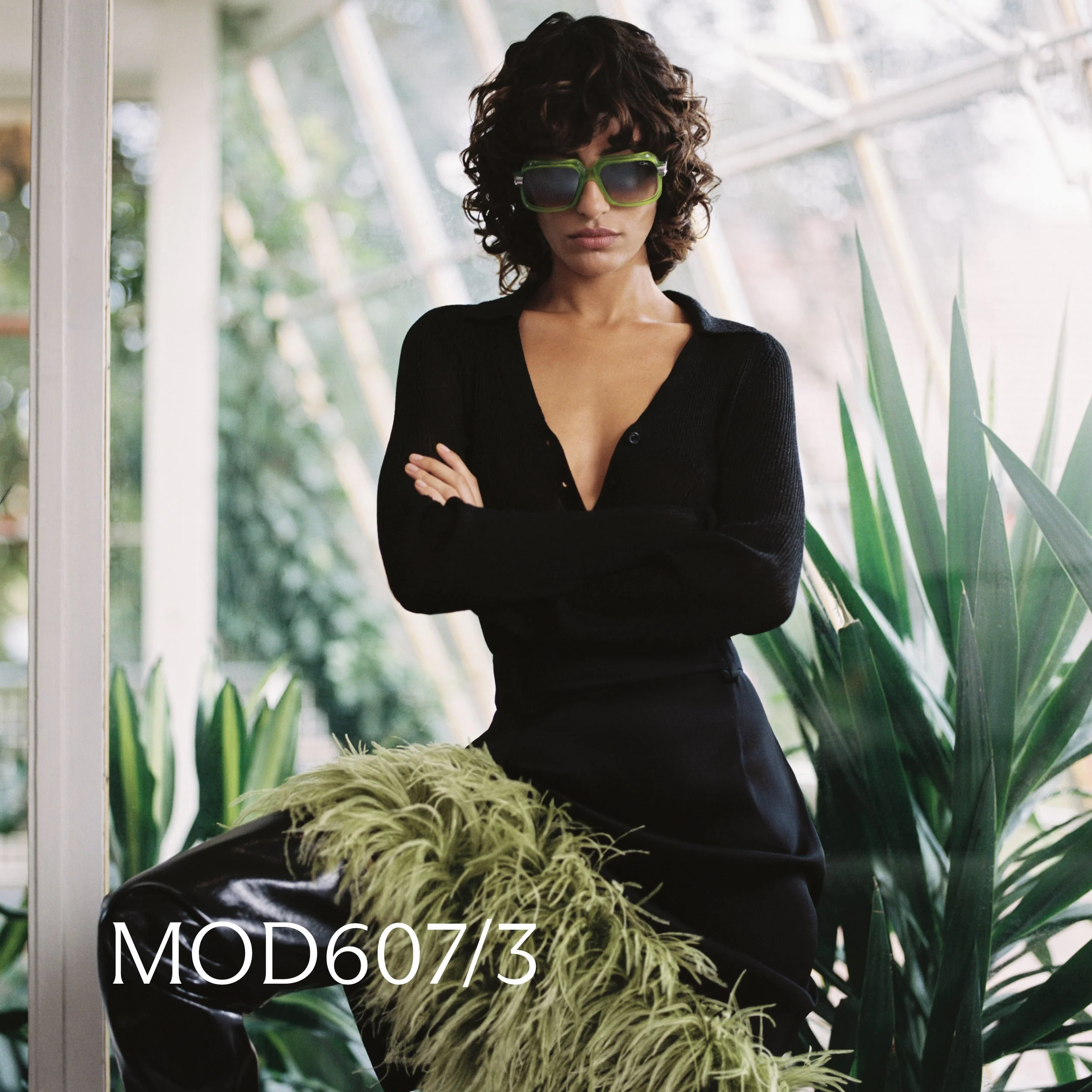 Woman wearing Cazal 607/3 sunglasses in green