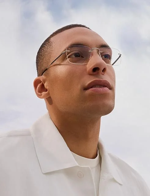 Model wearing Silhouette The Visionary 5586 eyeglasses with square lenses