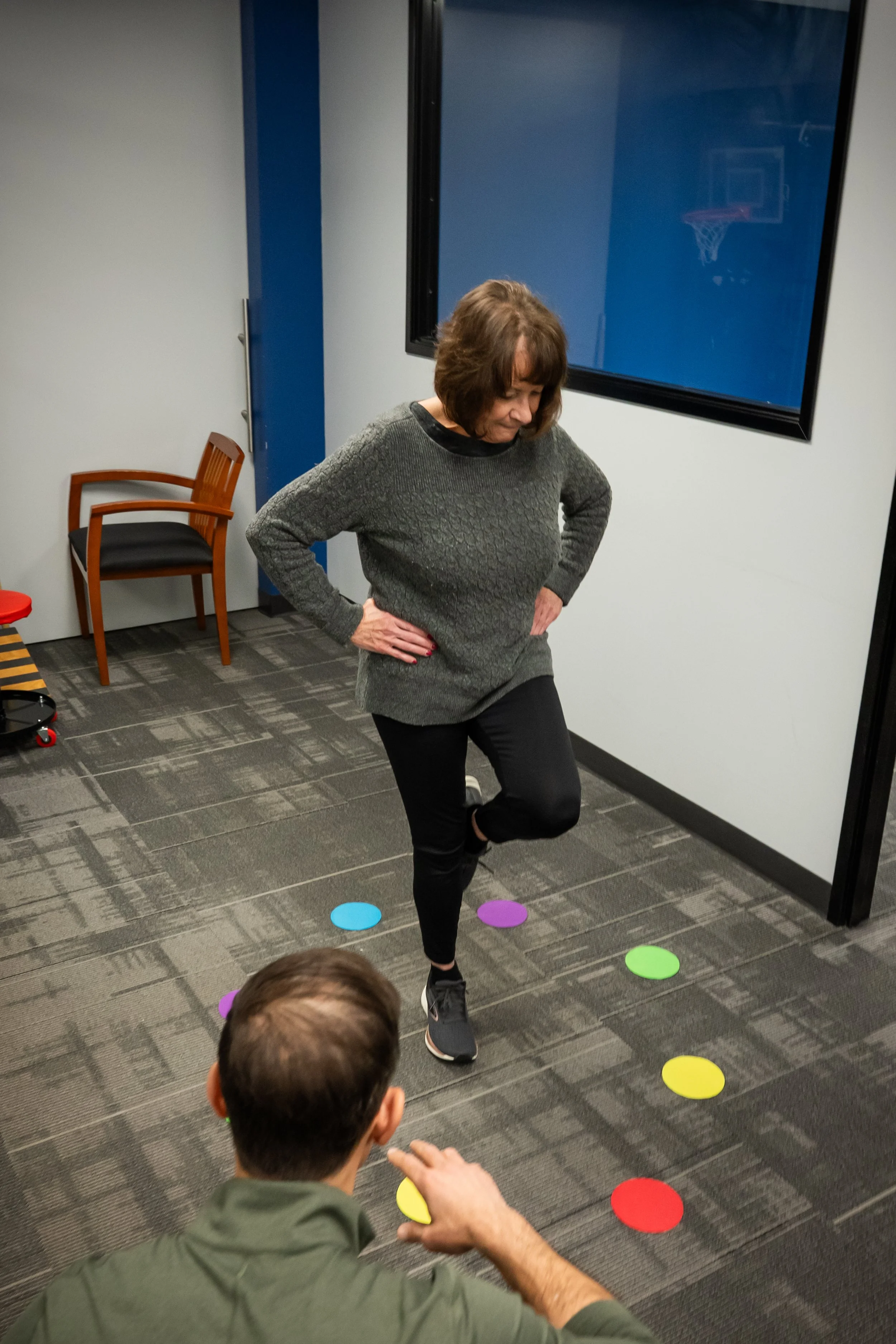 Active adult doing balance exercises