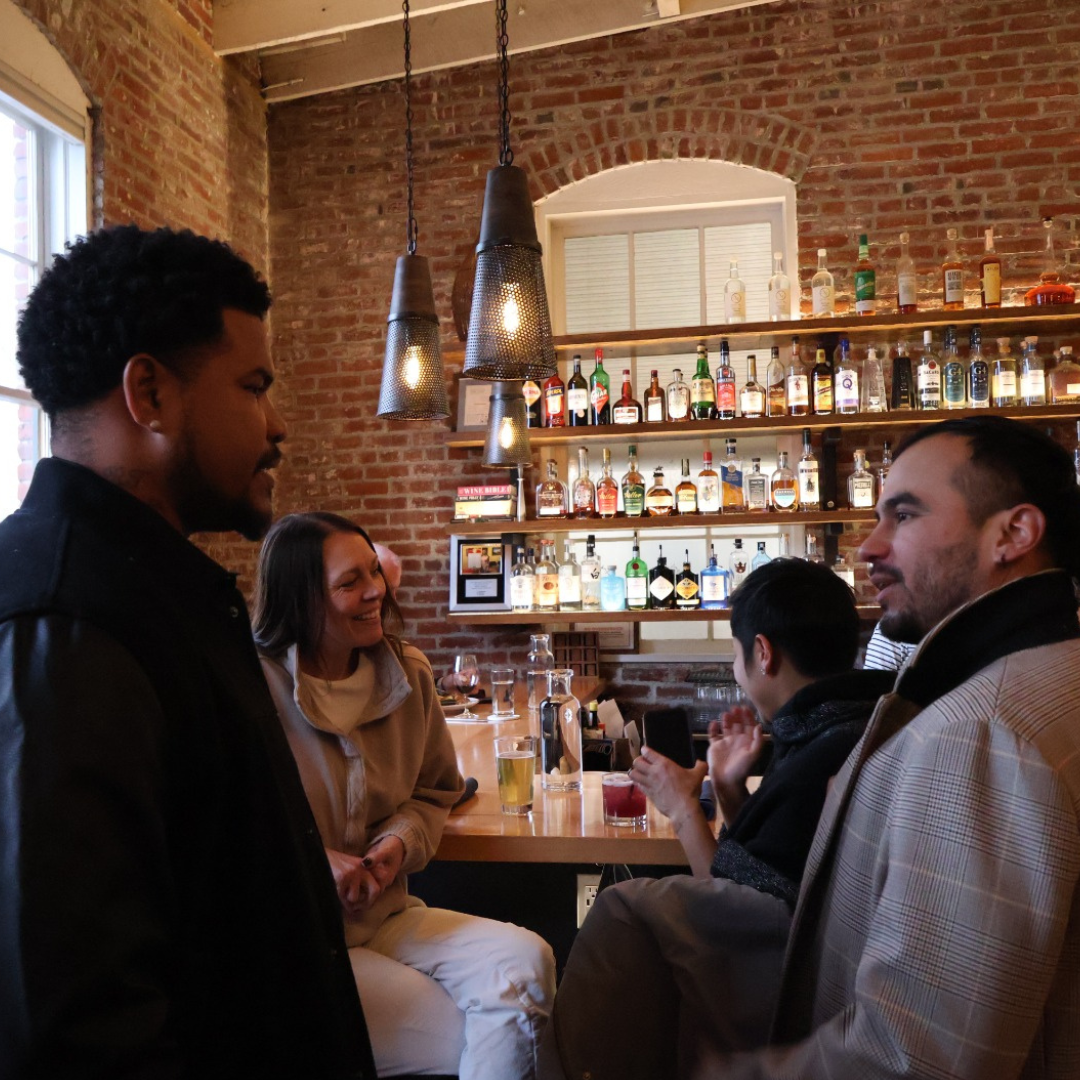Roman Torres meeting with community members at a Walla Walla event focused on youth and community engagement