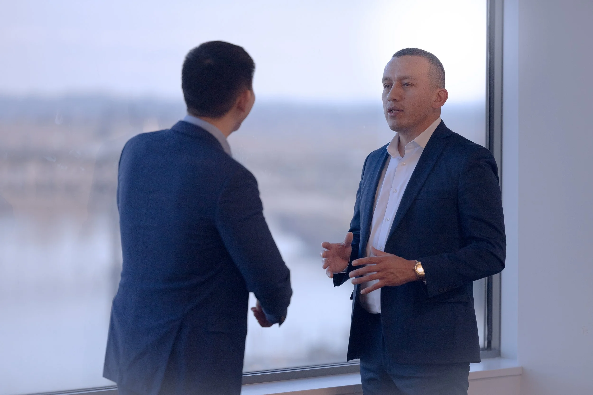 Pedro Gomez, Seattle-based strategic advisor, speaking with a client about partnerships and project strategy