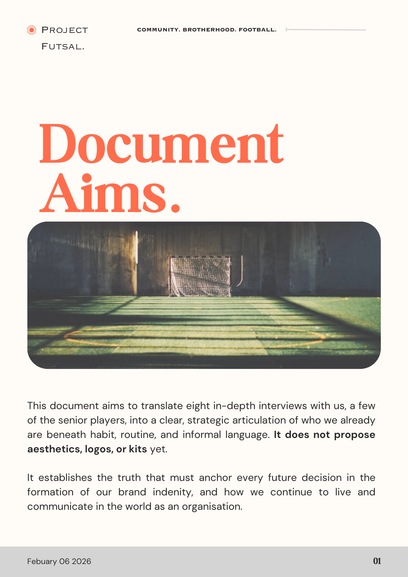 Document titled 'Document Aims' with a photo of an indoor soccer goal on a padlocked field.