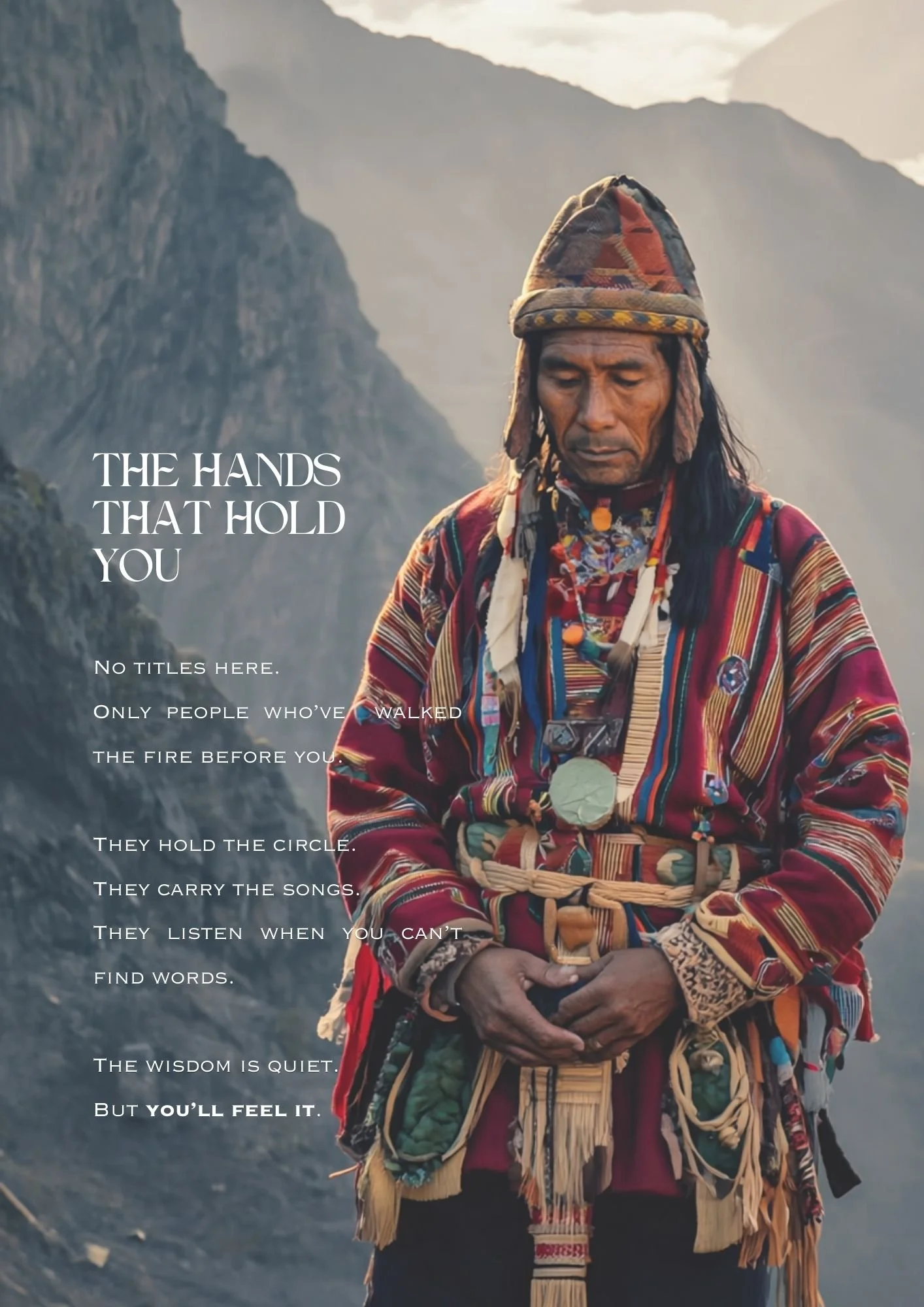 A man dressed in traditional indigenous clothing, standing with his head bowed and hands clasped in front of him, in a mountainous outdoor setting during daylight.