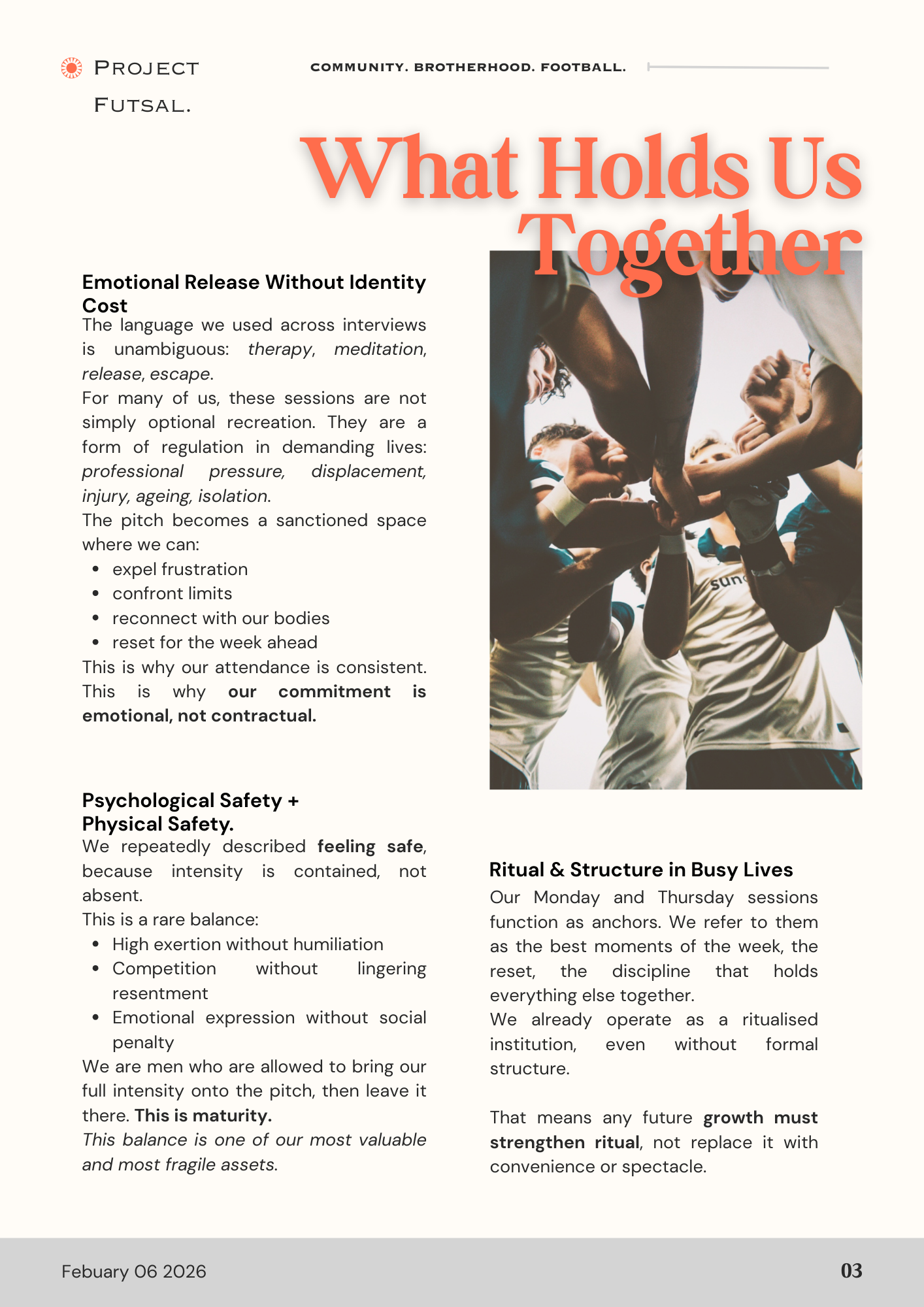 Group of people forming a team huddle, wearing sports uniforms, in a sports setting.