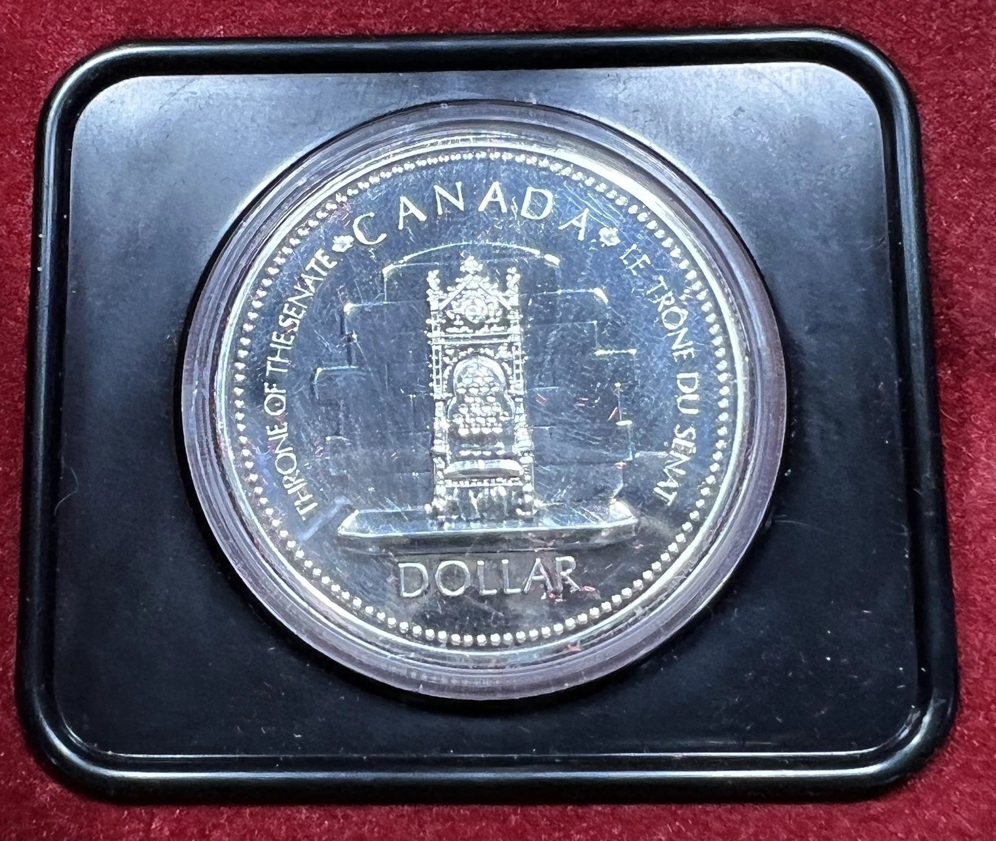 1977 Canadian $1 Throne of the Senate (Queen's Silver Jubilee) Silver Coin