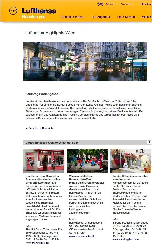 Screenshot einer Webseite über Highlights in Wien, mit einem Bild von belebter Straße im Stadtzentrum, umgeben von historischen Gebäuden und Lichtern.