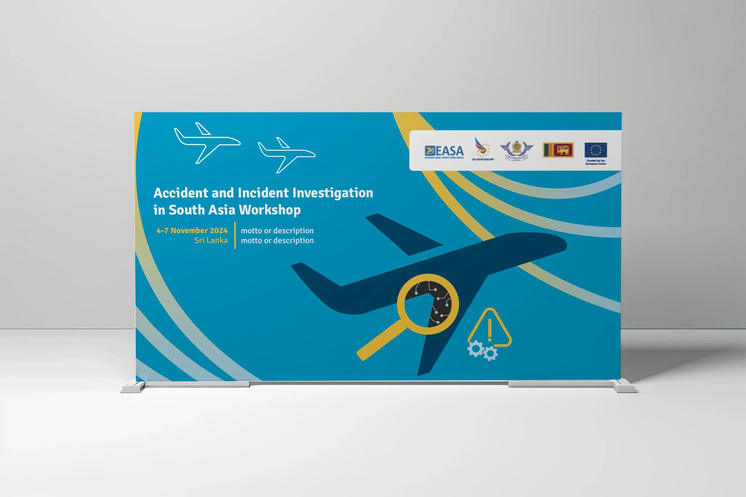 Blue conference banner for the 'Accident and Incident Investigation in South Asia Workshop' held in Sri Lanka from November 4-7, 2024, featuring stylized airplane icons, a magnifying glass over an airplane, and safety icons, with logos of EASA and ot
