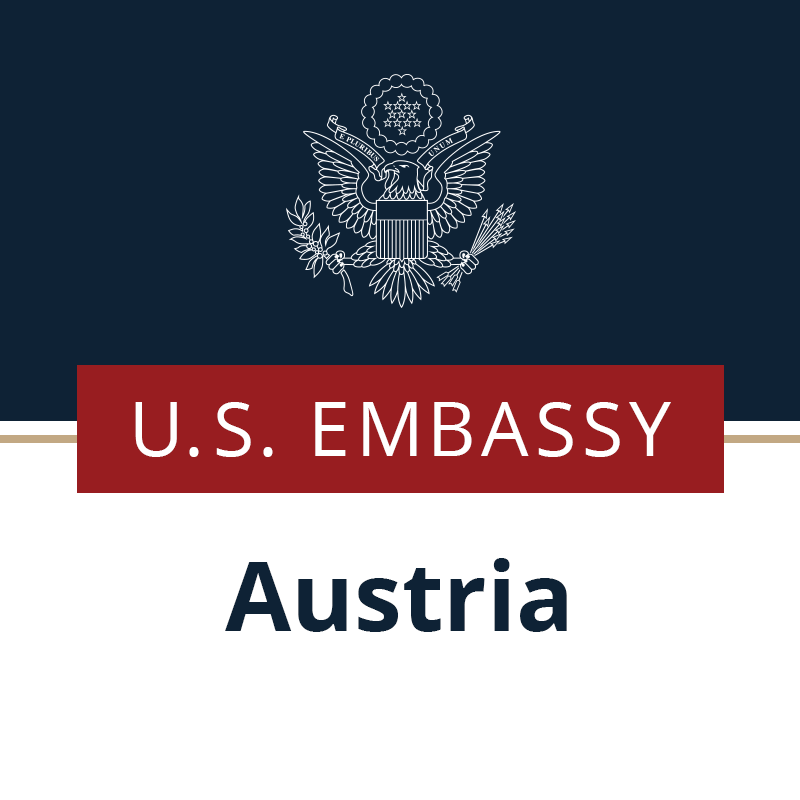 U.S. Embassy logo with the American eagle emblem and the text 'U.S. EMBASSY Austria'.