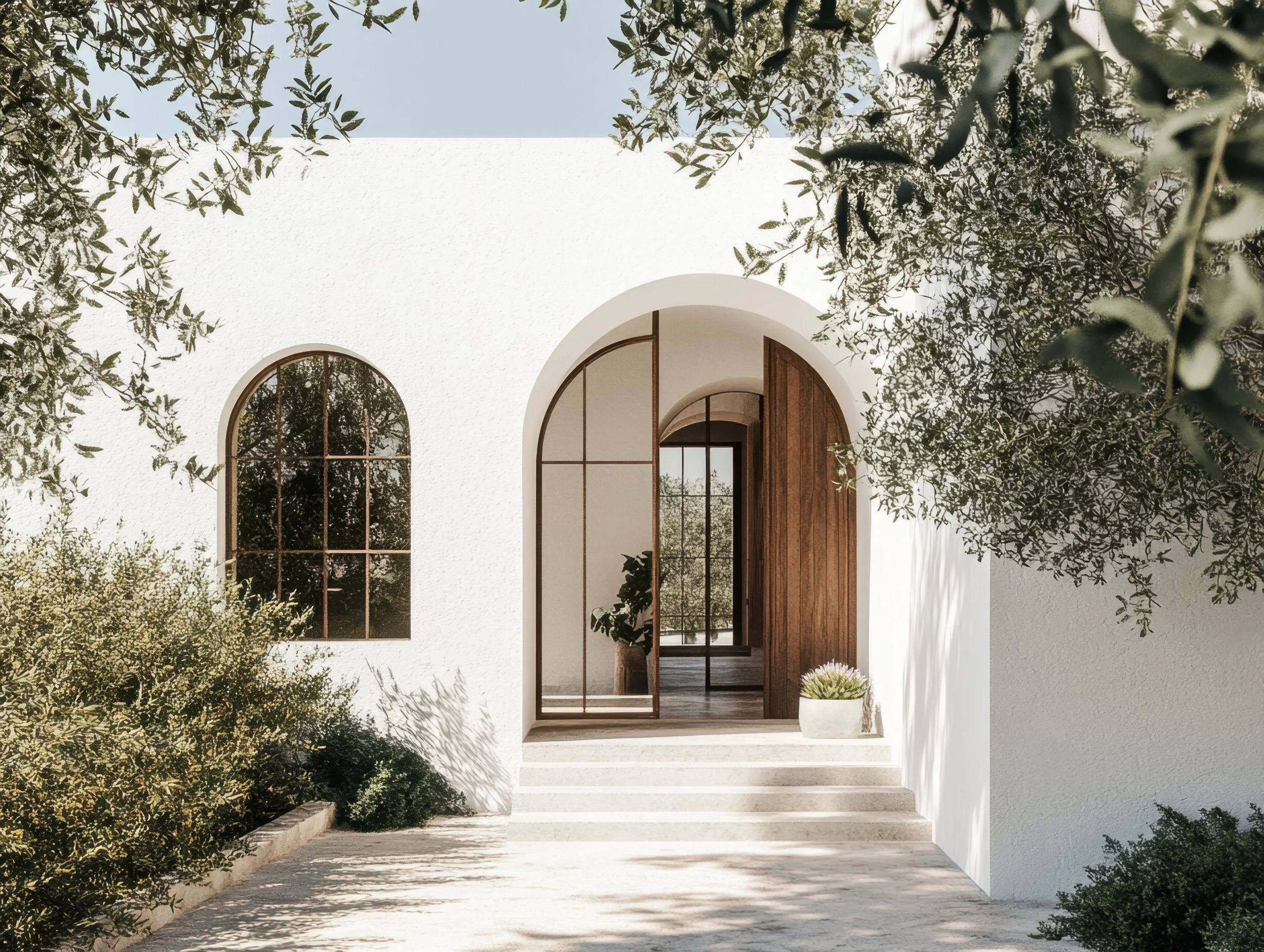 Modern Mediterranean home entryway representing personal growth, relationship coaching, and intentional living.