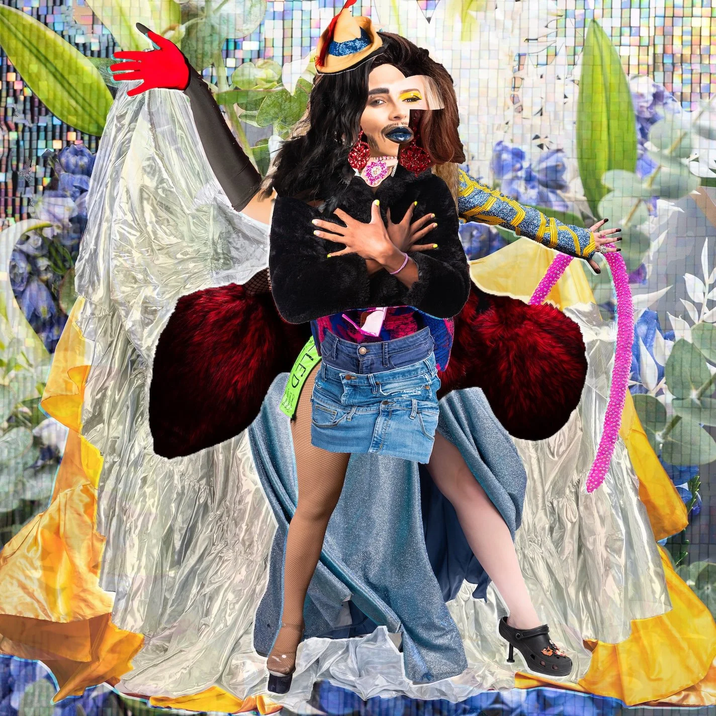 Fine Art Digital Collage by Minneapolis Photographer Jay Cupcake. A person with a colorful, eclectic outfit and makeup standing in front of an abstract background with floral and geometric patterns. They are crossing their arms over their chest, wear