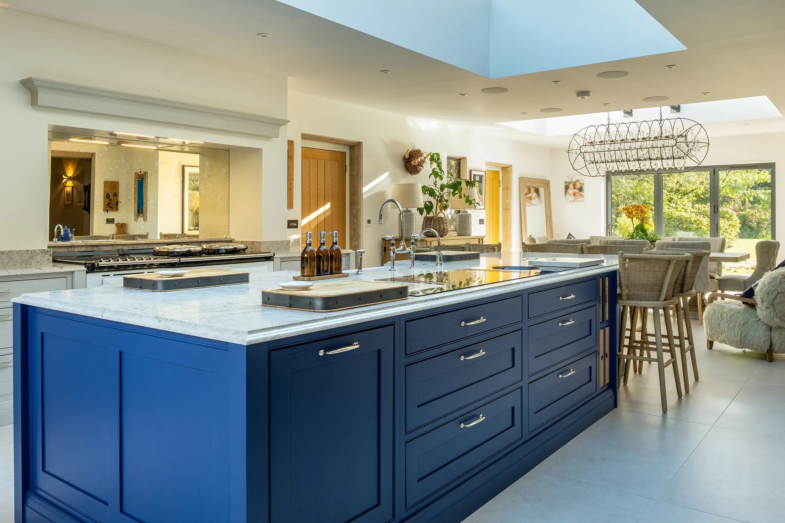 Bespoke classic in-frame Shaker kitchen with deep blue island, Farrow & Ball French Grey and Drawing Room Blue cabinetry, Fauld Manor, Staffordshire, by Portree Kitchens