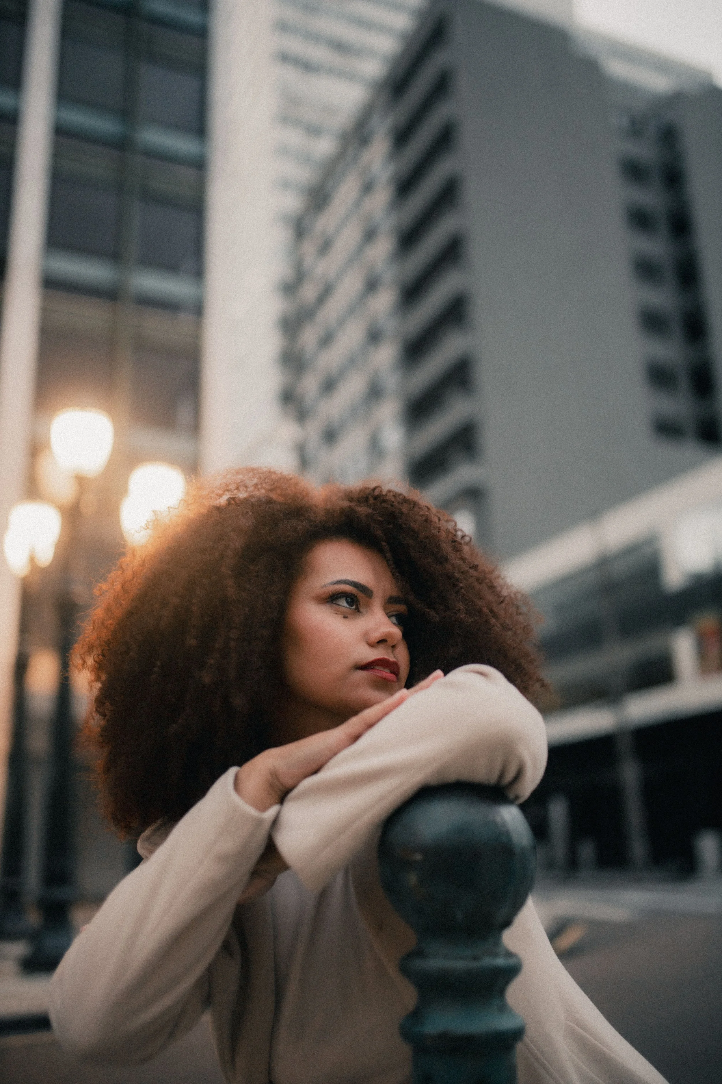 A Black woman in a peaceful, open expression, representing the process of learning to receive consistent love and building earned security through attachment-based therapy in New York and New Jersey.