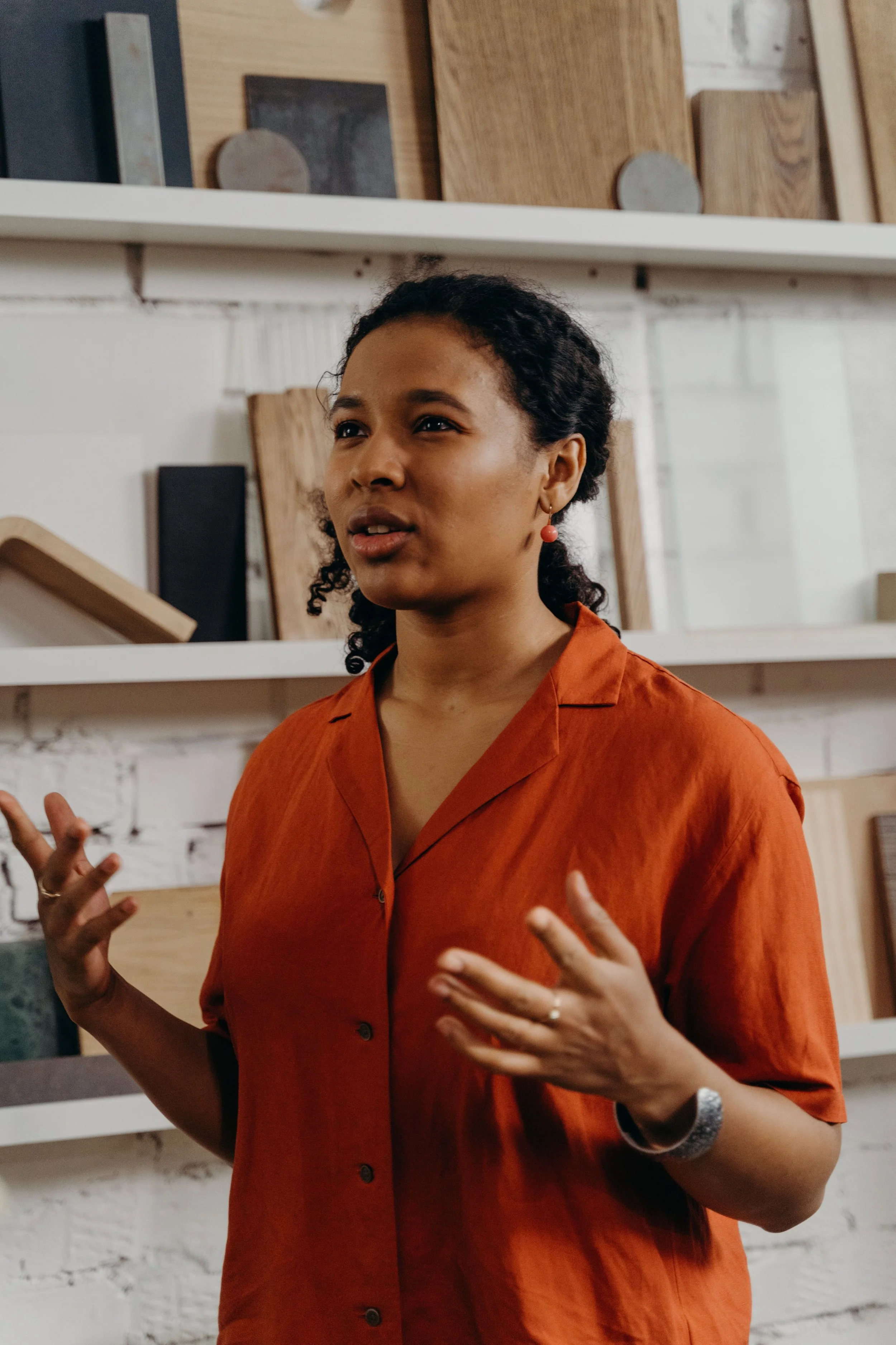 A Black woman in a relationship moment, representing the invisible emotional labor and over-giving that people-pleasing produces in romantic relationships.