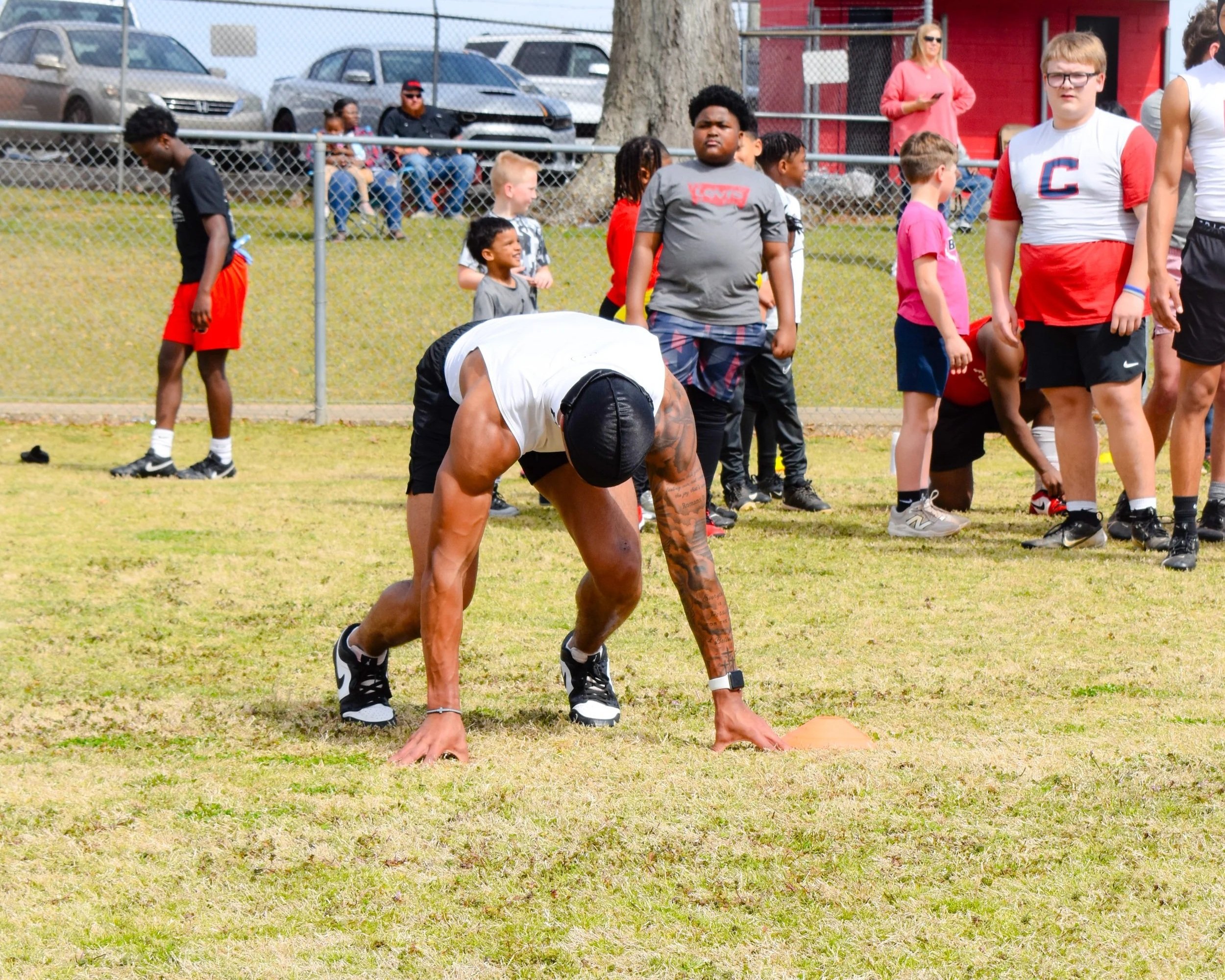 Athlete preparing to run the 40 yard dash at the Peoples 1% Training "Next Level Camp".