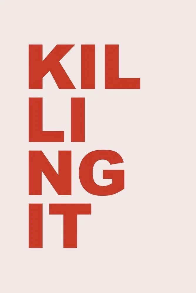 Red text on a light background spelling out "KILLING IT" vertically with the words split into two parts.