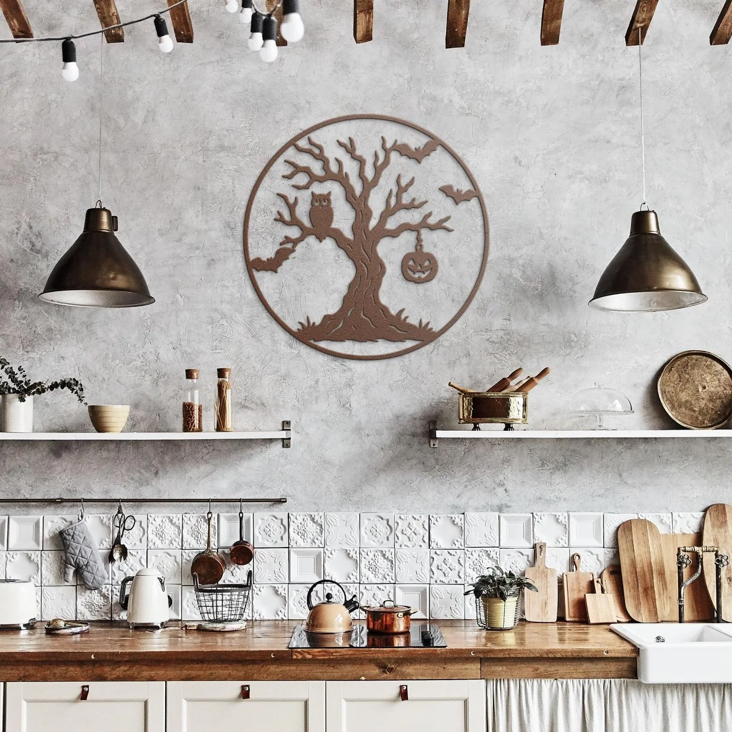 A kitchen with a rustic style featuring a white tiled backsplash, wooden countertop, and open shelves with kitchenware. Decorative elements include a metal wall art of a tree with an owl and a pumpkin, hanging light fixtures, and various kitchen items like cutting boards, pots, and plants.