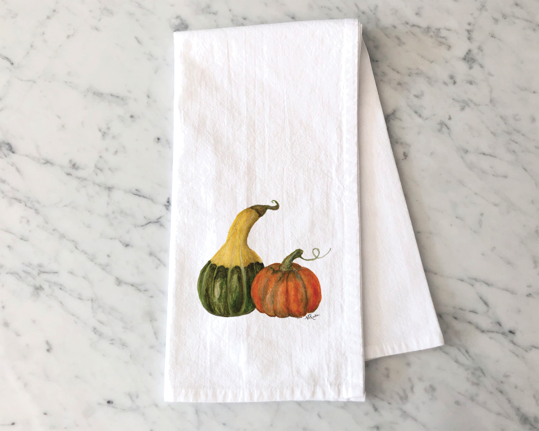 Colorful illustration of three pumpkins, yellow, green, and orange, on white textured paper, placed on a white marble surface.