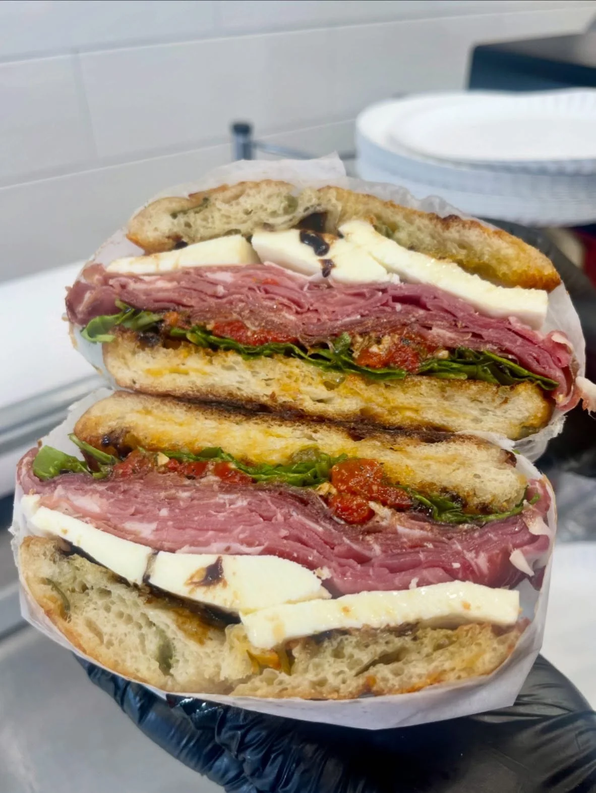 Get a taste of our #8😝🥪 It&rsquo;s here for a good time not a long time! 
&bull;
Imported prosciutto, fresh mozzarella,roasted red peppers, arugula, balsamic glaze, extra virgin olive oil on the famous Dina&rsquo;s Delights sourdough OR focaccia br