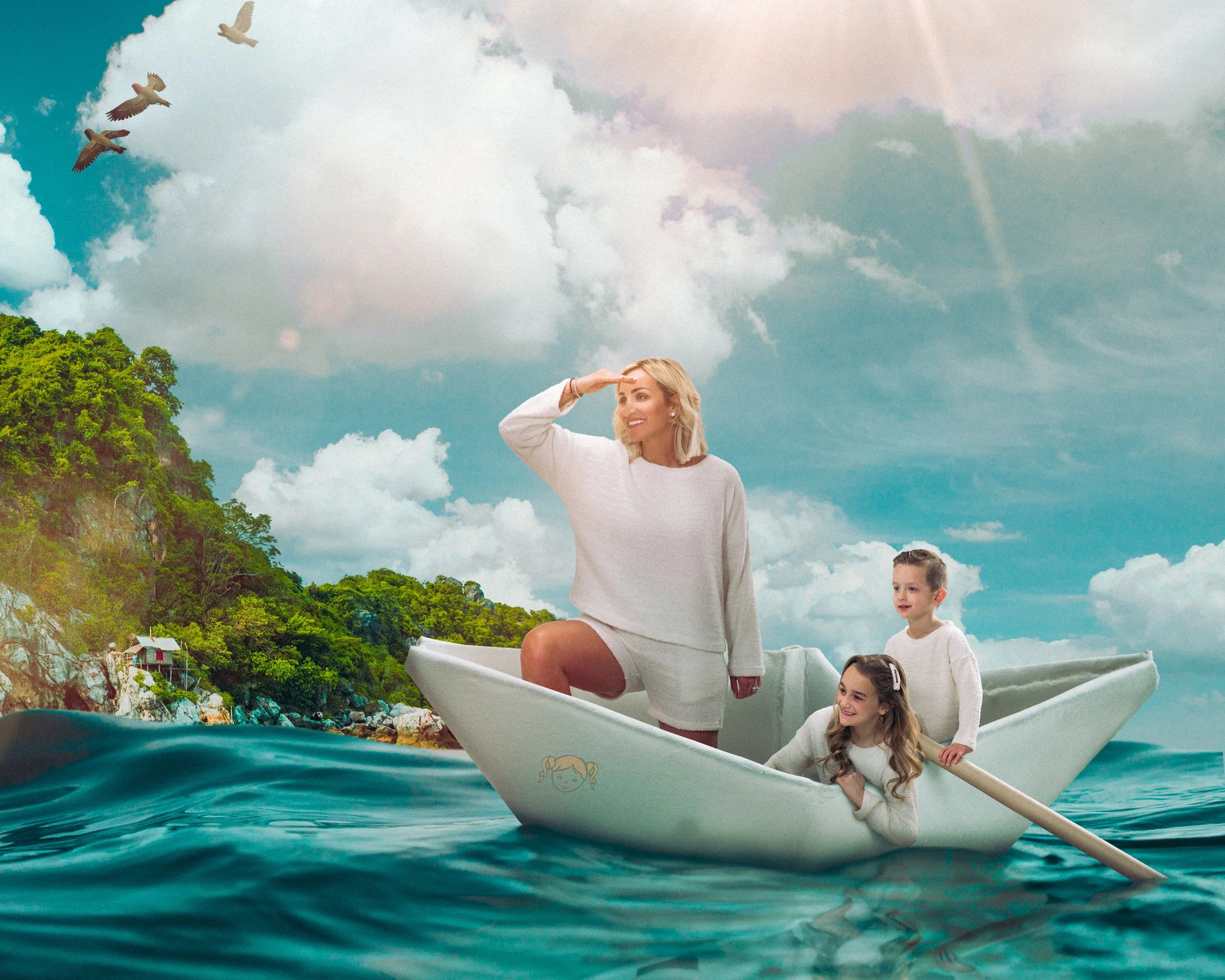 A woman and two children on a paper boat in a body of water, with a coastal landscape and sky with clouds and flying birds in the background