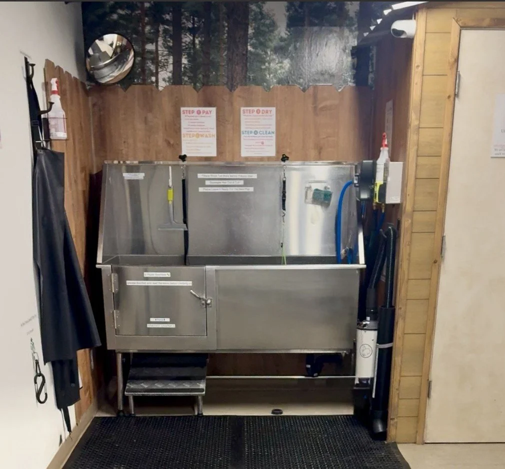 A self-serve stainless steel dog wash tube at Hood River Hound Wash in Hood River, Oregon