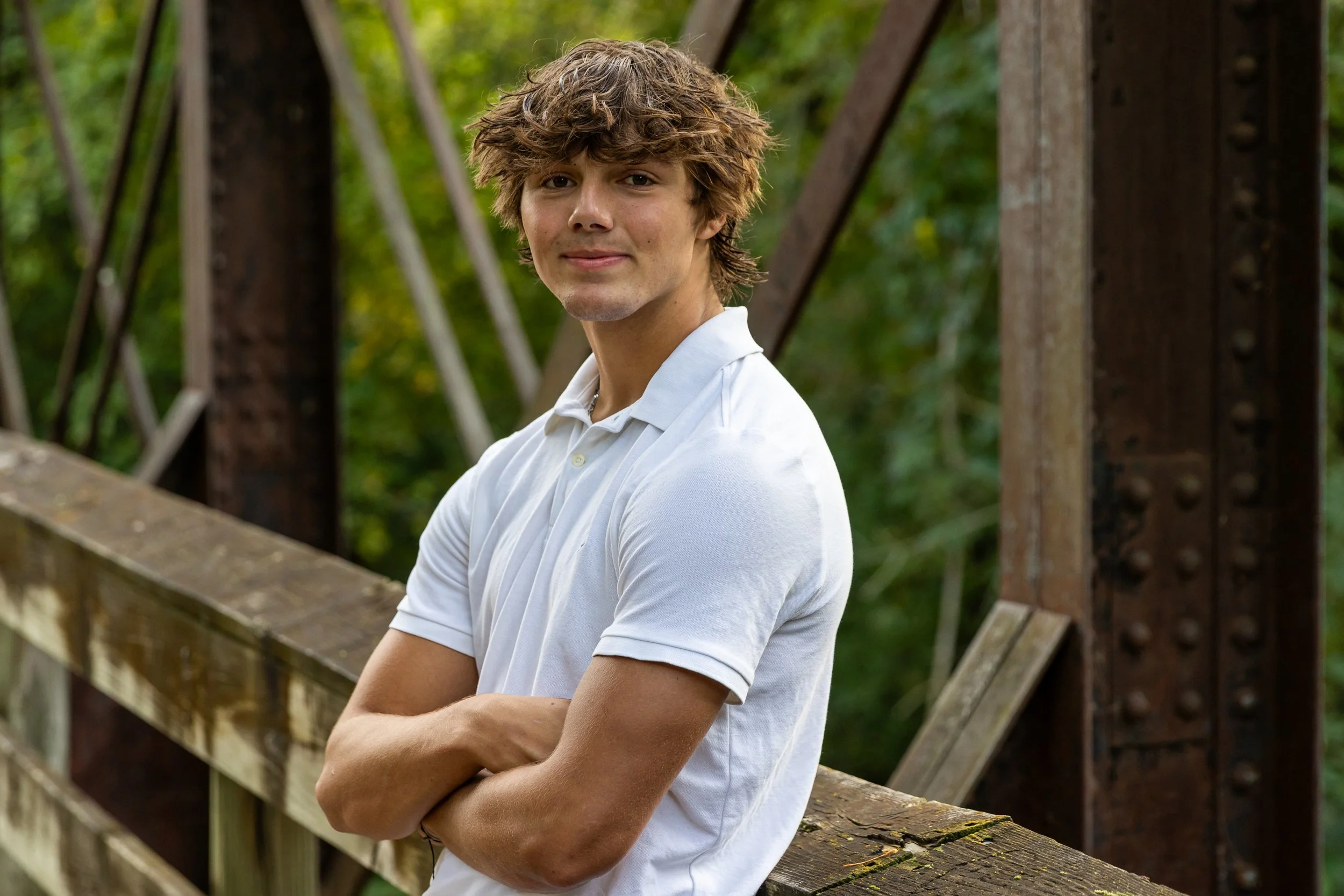 Senior photo of young man taken outdoors in Menomonie