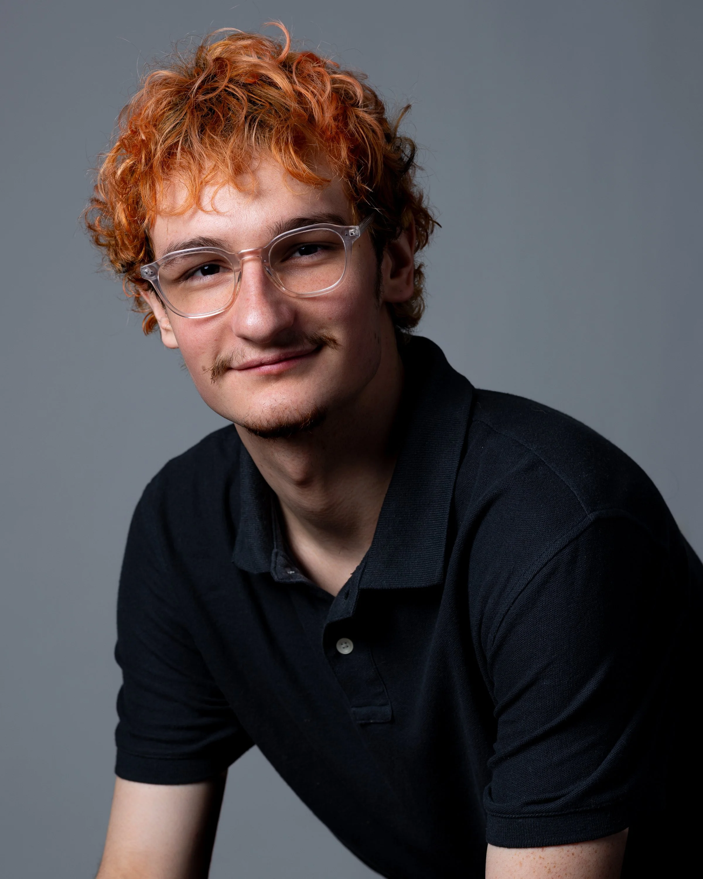 Senior photo of young man taken in a studio in Menomonie