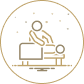 Person working on a laptop at a desk.
