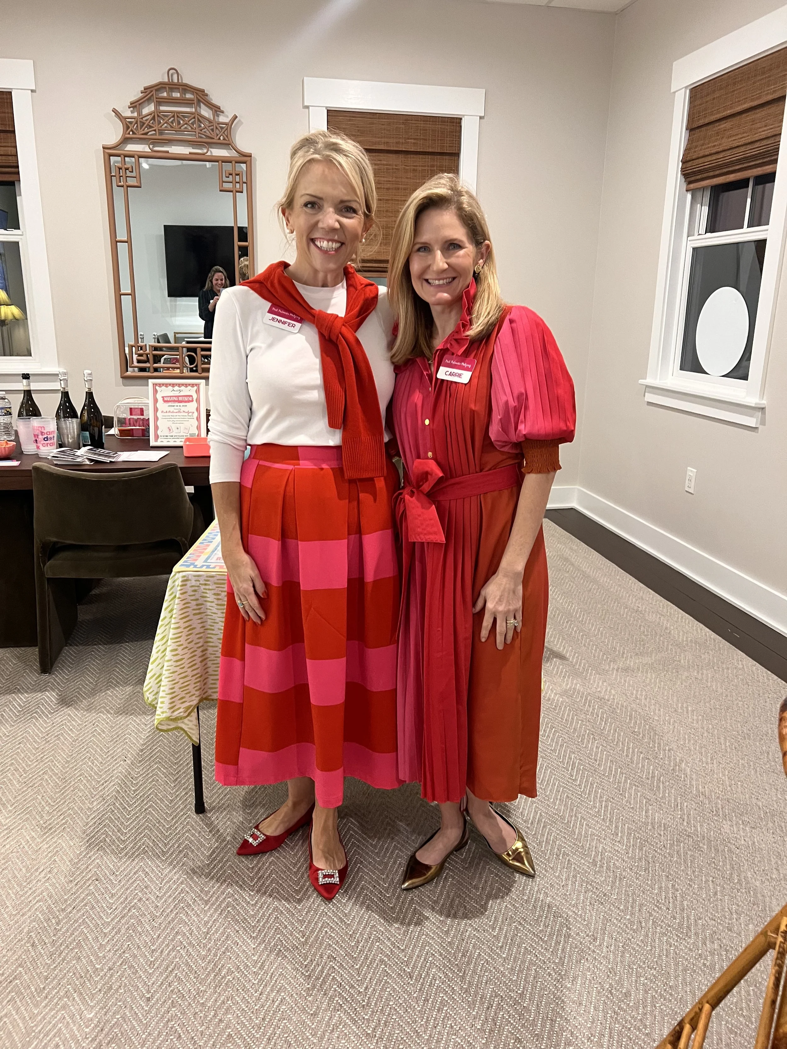 Jennifer Kenwell and Carrie Collins teaching Mahong at Collins Group Realty in Bluffton, SC.