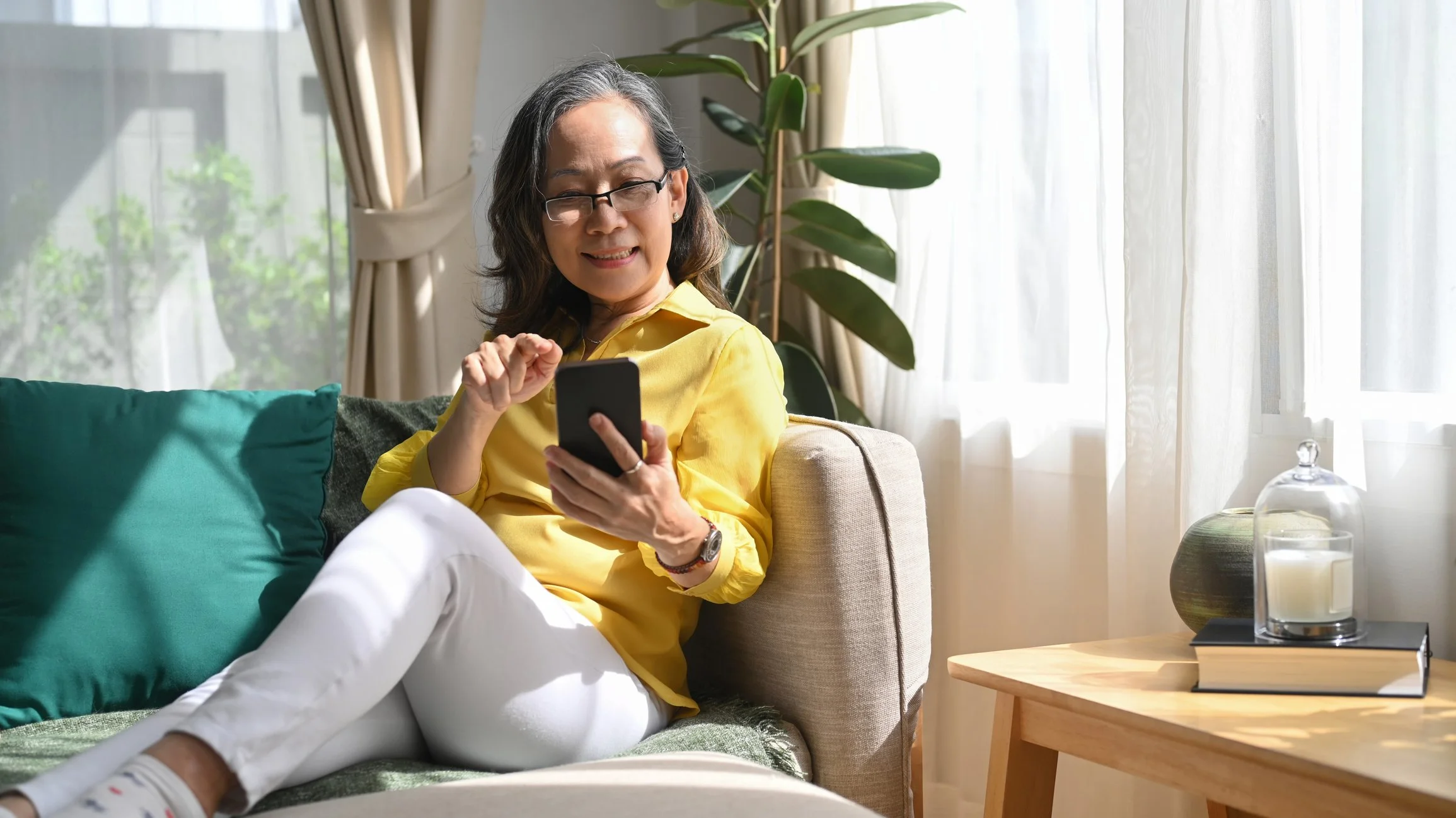 Woman booking a session on mobile device.