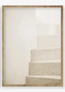 Soft neutral staircase in natural light, symbolizing transition and clarity.